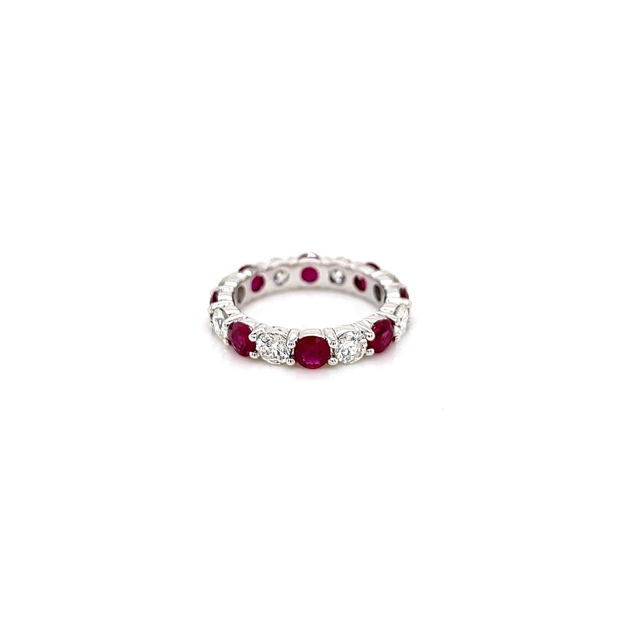3.52Carat Ruby and Diamond Eternity Band

-Metal Type: 18K White Gold 
-2.02Carat Round Cut Ruby 
-1.50Carat Round Natural Diamonds
-Size 6.0


Made in New York City