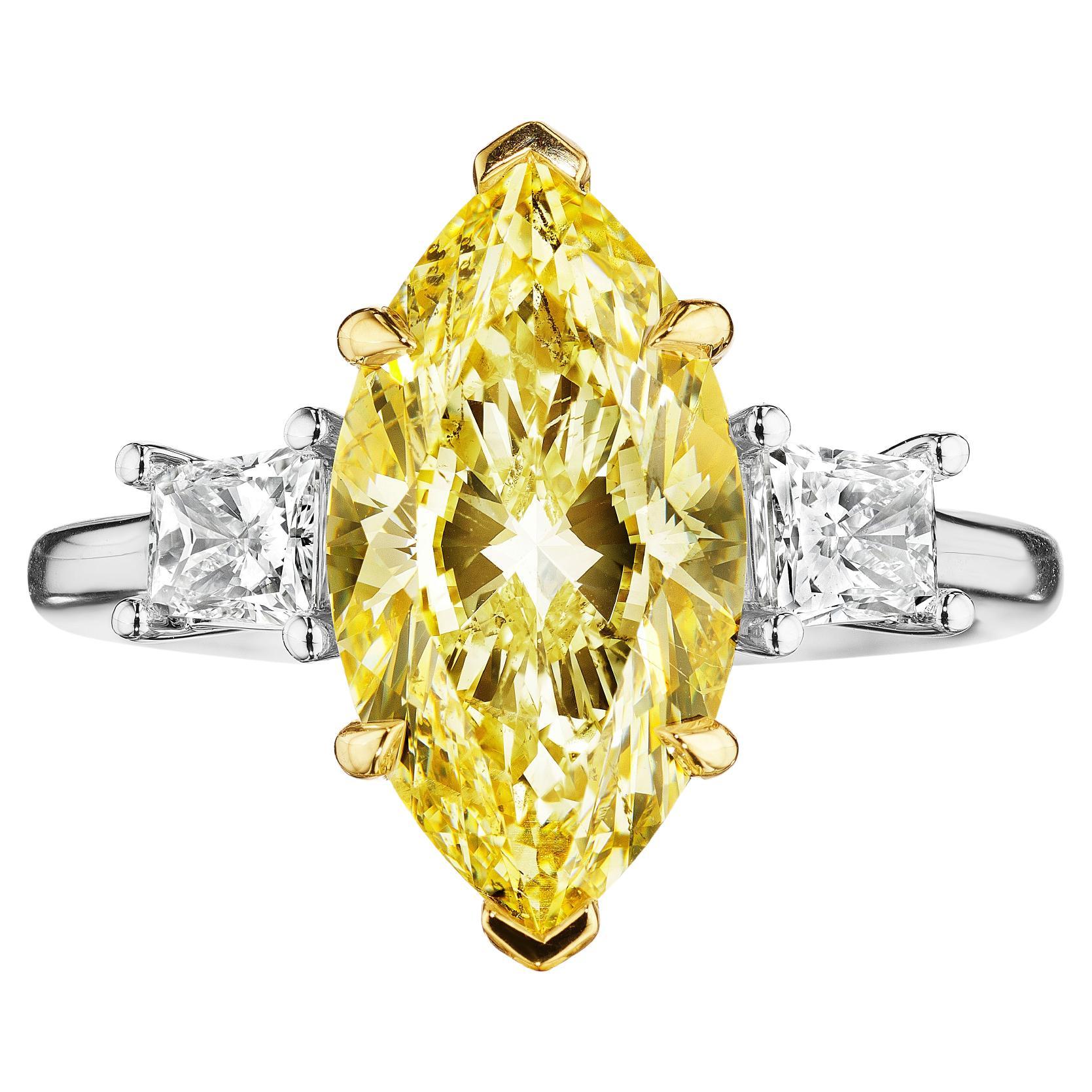 3.52ct GIA Certified Fancy Light Yellow Marquise & Tapered Baguette Diamond Ring For Sale