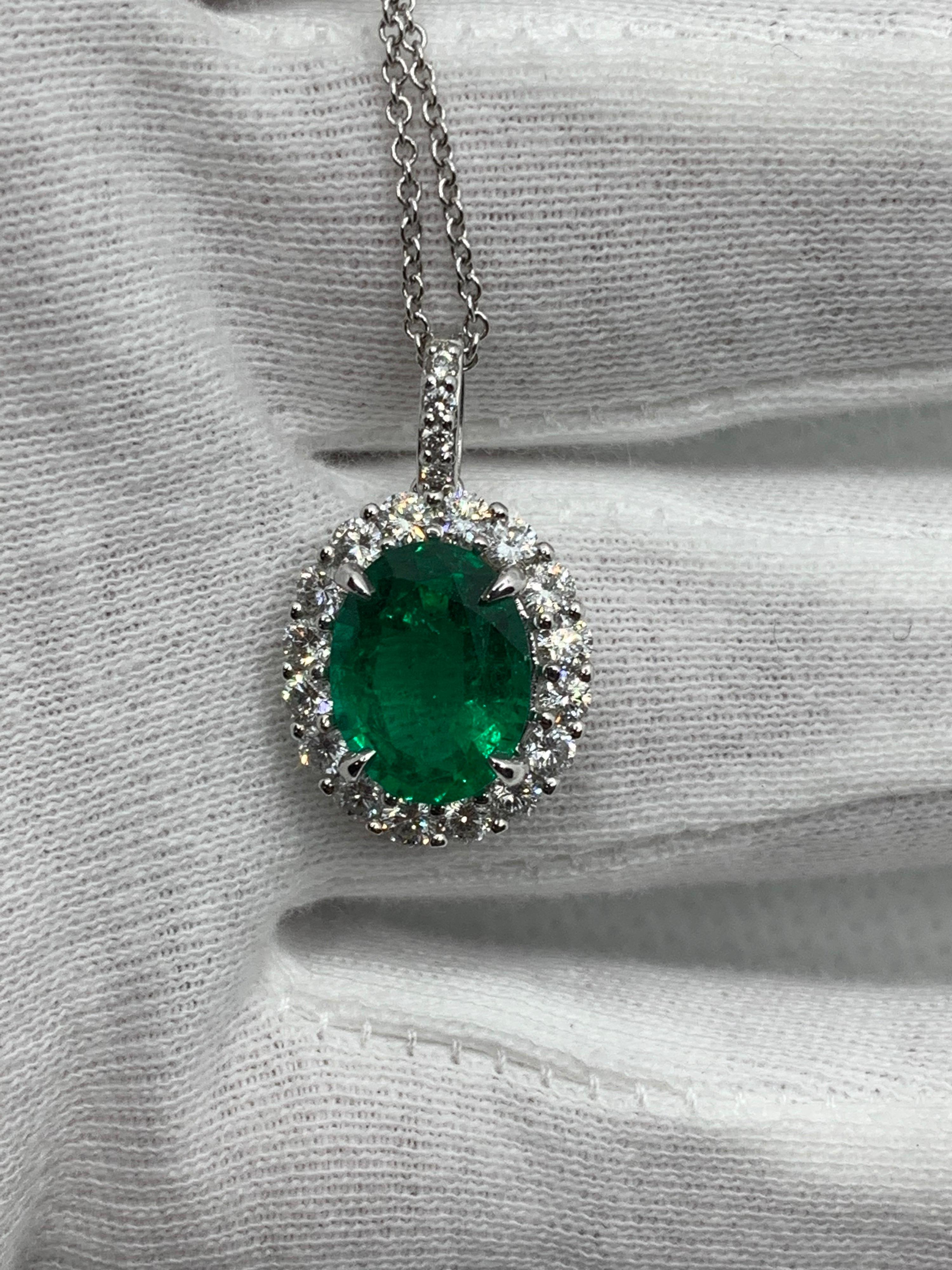 Oval Cut Auction - GIA Certified 3.53 Carat Oval Emerald and Diamond Pendant For Sale