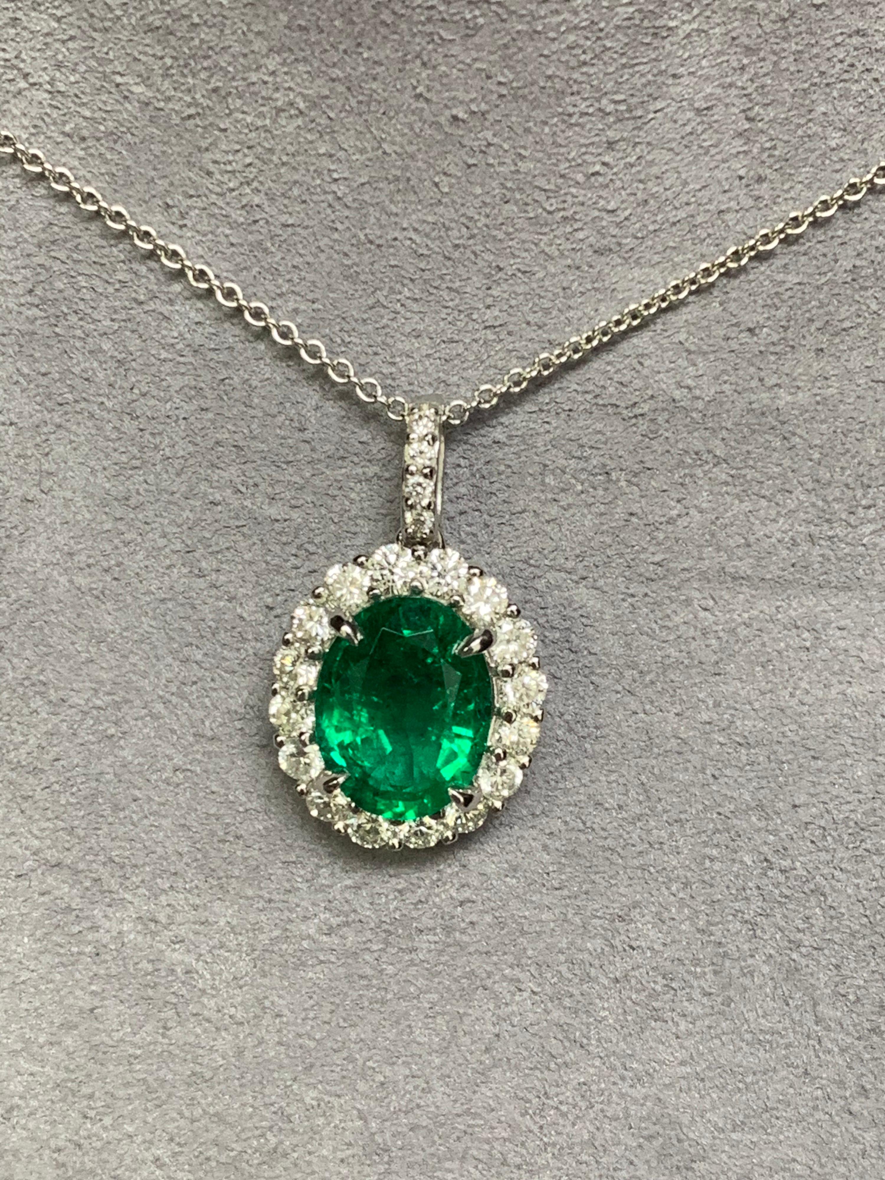 Auction - GIA Certified 3.53 Carat Oval Emerald and Diamond Pendant For Sale 1