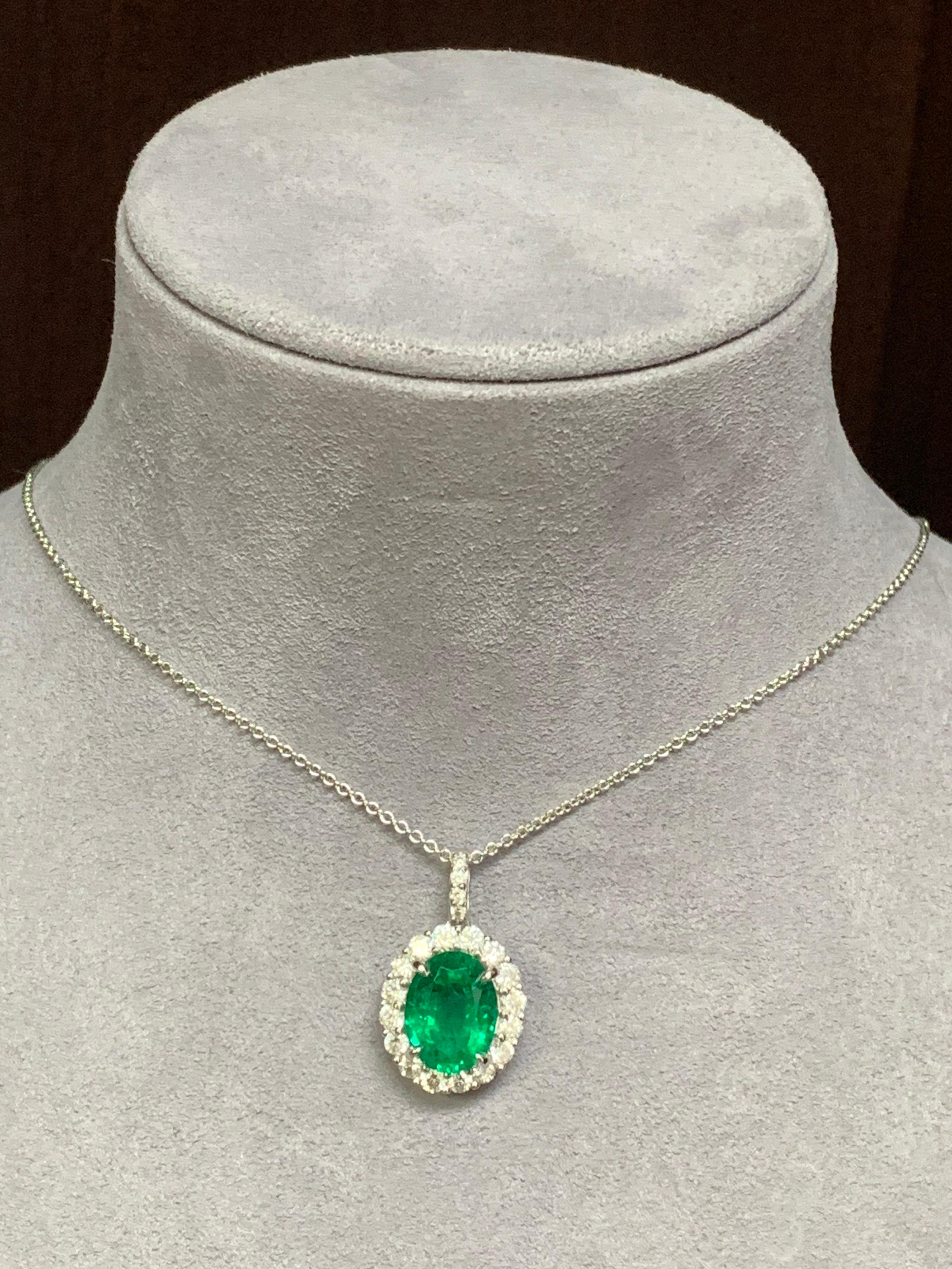 Women's or Men's Auction - GIA Certified 3.53 Carat Oval Emerald and Diamond Pendant For Sale