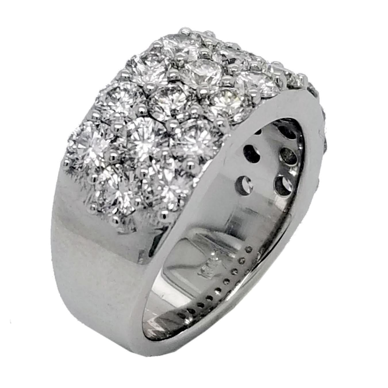 This beautiful Anniversary Ring is made of 18 Karat White gold showcasing 28 perfectly matched Round Brilliant Diamonds Set in Shared Prong Mode.
The diamonds are VS Clarity E to F Color.
Total Weight of diamonds: 3.53 Ct  (28 pieces of 3.2