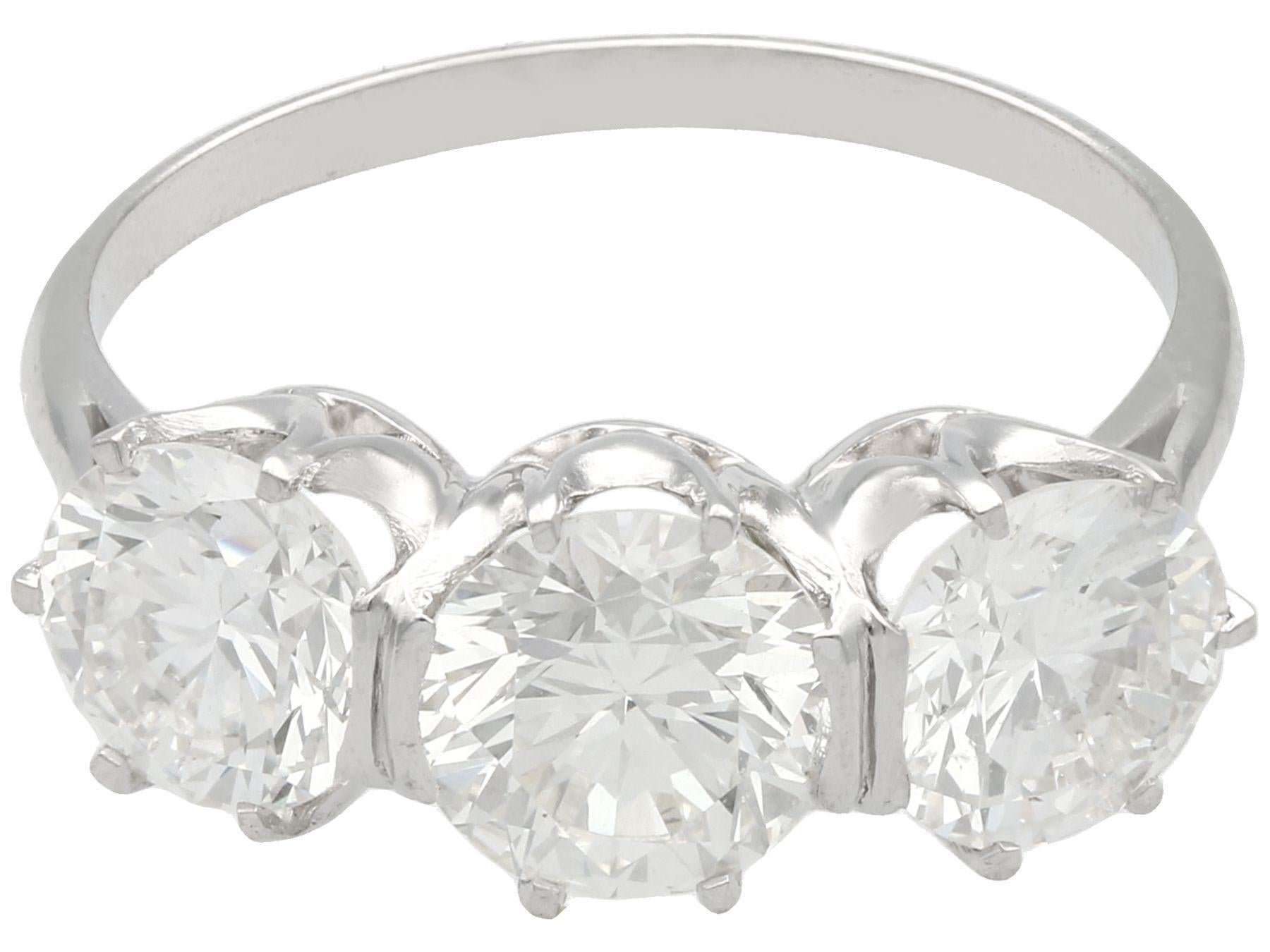 Round Cut Vintage 3.53 Carat Diamond and Platinum Trilogy Engagement Ring For Sale