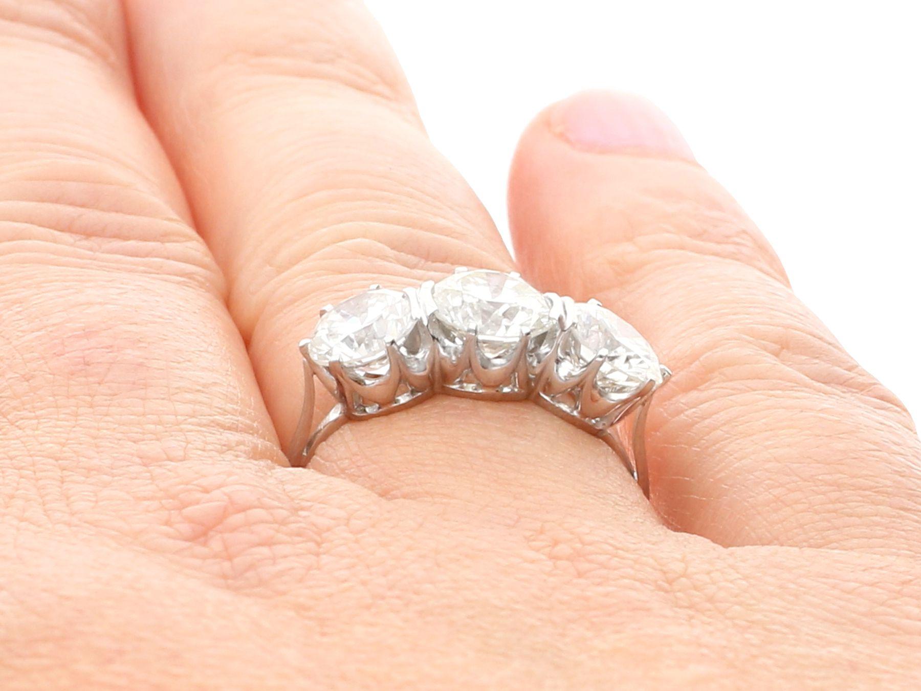 Vintage 3.53 Carat Diamond and Platinum Trilogy Engagement Ring For Sale 4