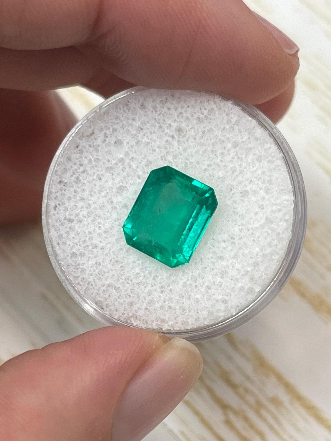 Modern 3.53ct Medium Bluish Green Colombian Emerald 10x8mm Emerald Cut Genuine May For Sale