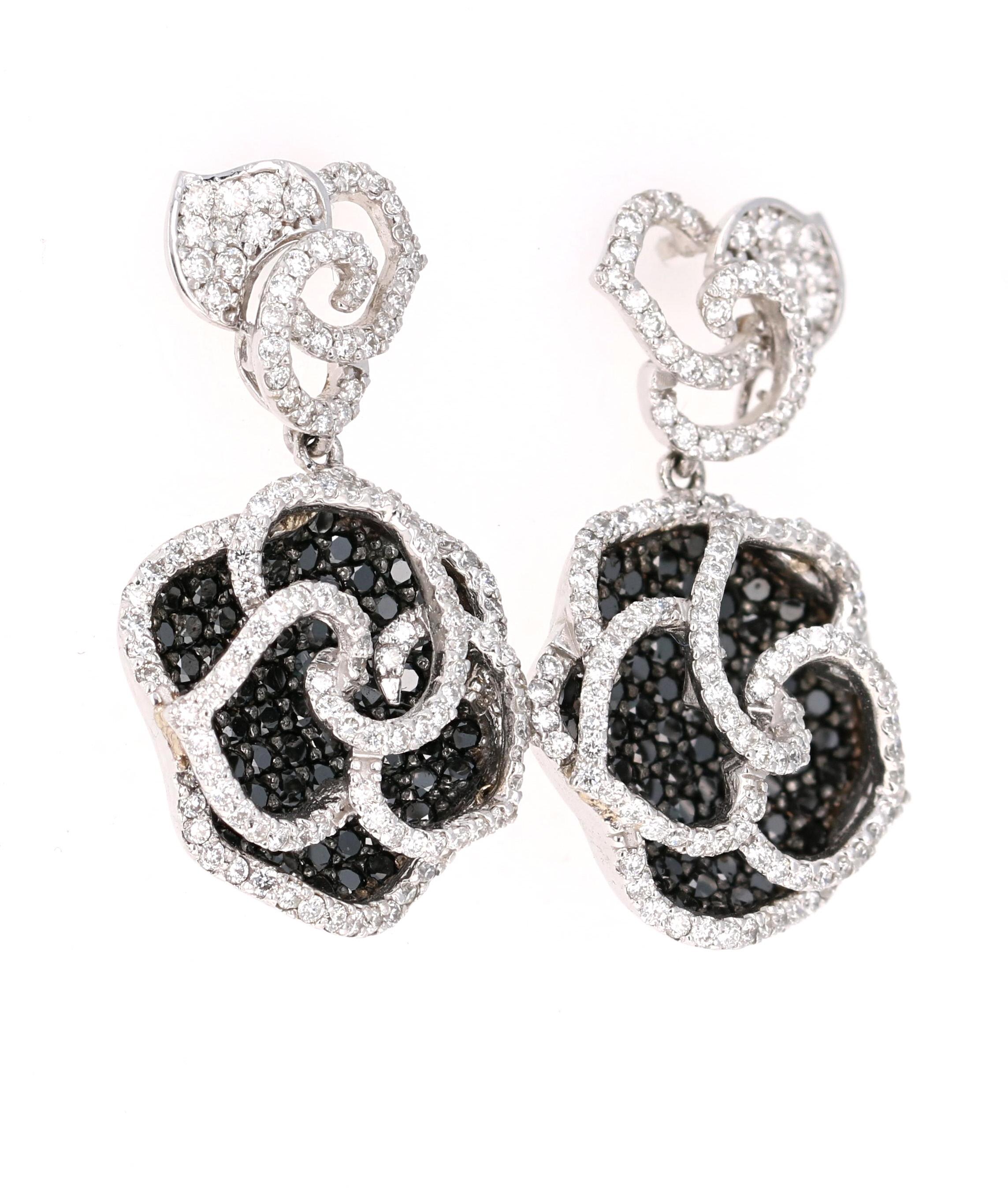 Stunning Black and White Diamond Earrings that are nothing less than a Statement! Beautiful Black Roses for your jewelry collection!

The ring is adorned with 160 Black Diamonds that weigh 1.98 Carats as well as 280 Round Cut Diamonds that weigh