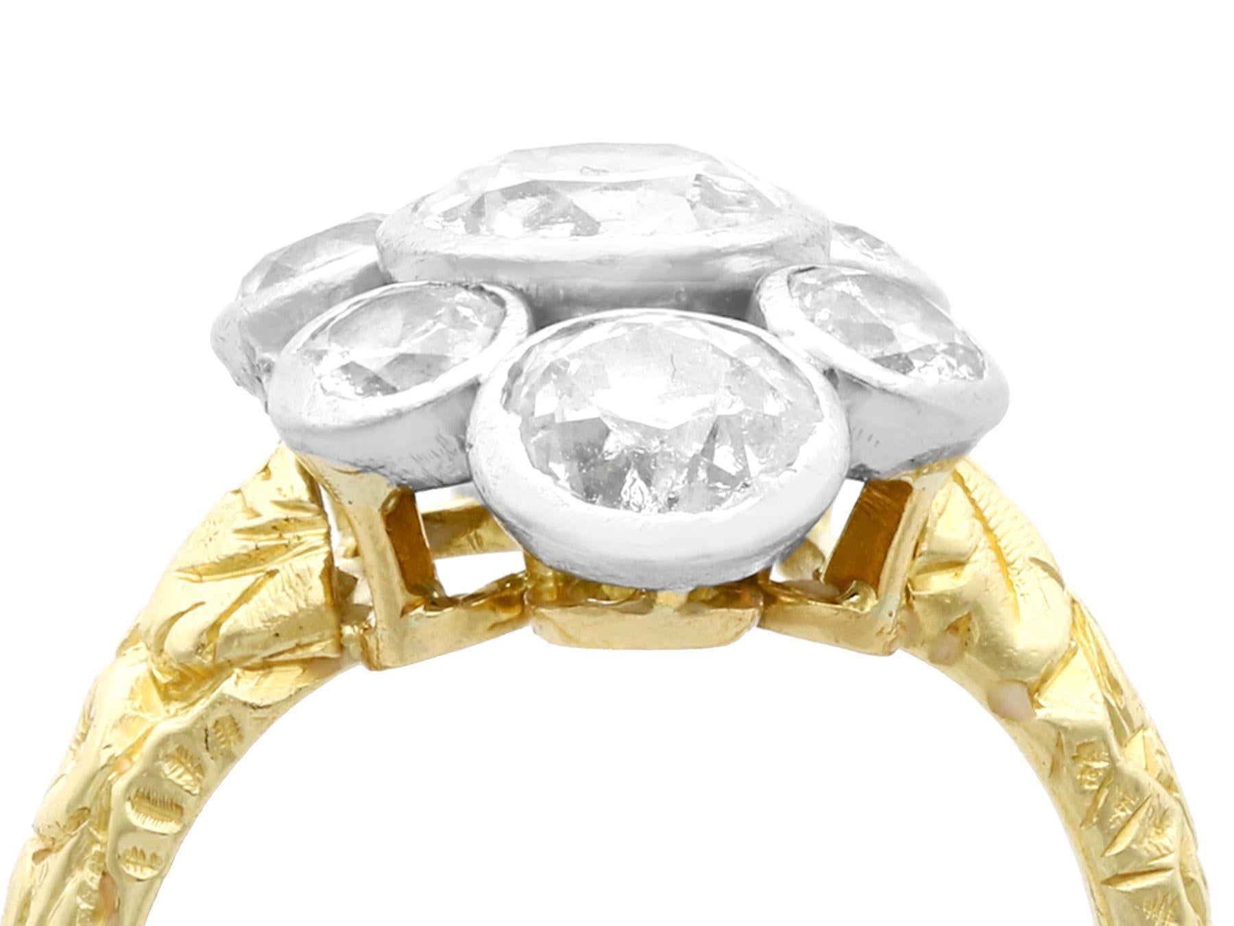 A stunning antique and vintage 3.54 carat diamond and 18 karat yellow gold cluster ring, with a platinum setting; part of our diverse diamond jewelry and estate jewelry collections.

This stunning, fine and impressive vintage diamond ring has been