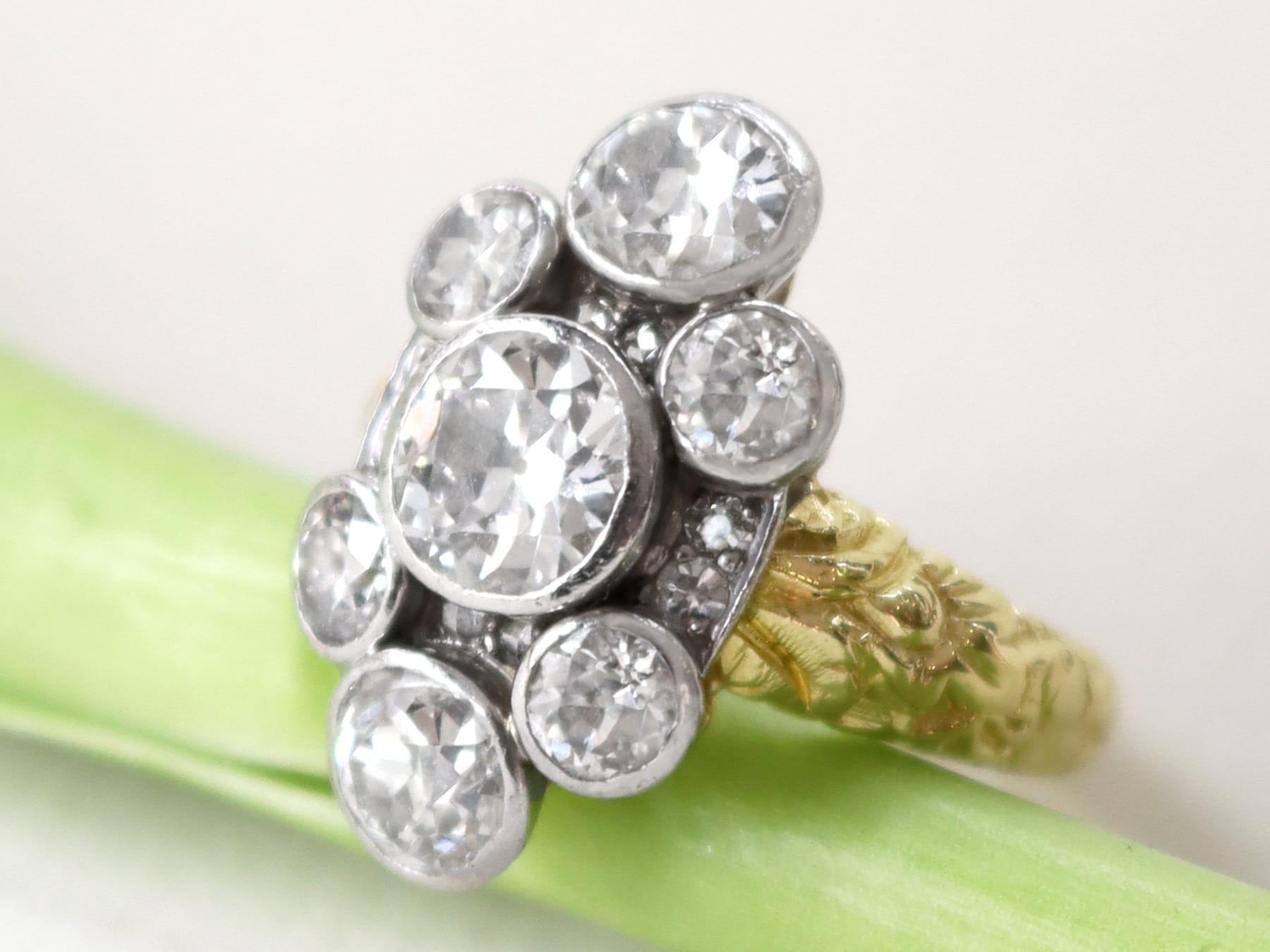 A stunning antique and vintage 3.54 carat diamond and 18 karat yellow gold cluster ring, with a platinum setting; part of our diverse diamond jewelry and estate jewelry collections.

This stunning, fine and impressive vintage diamond ring has been
