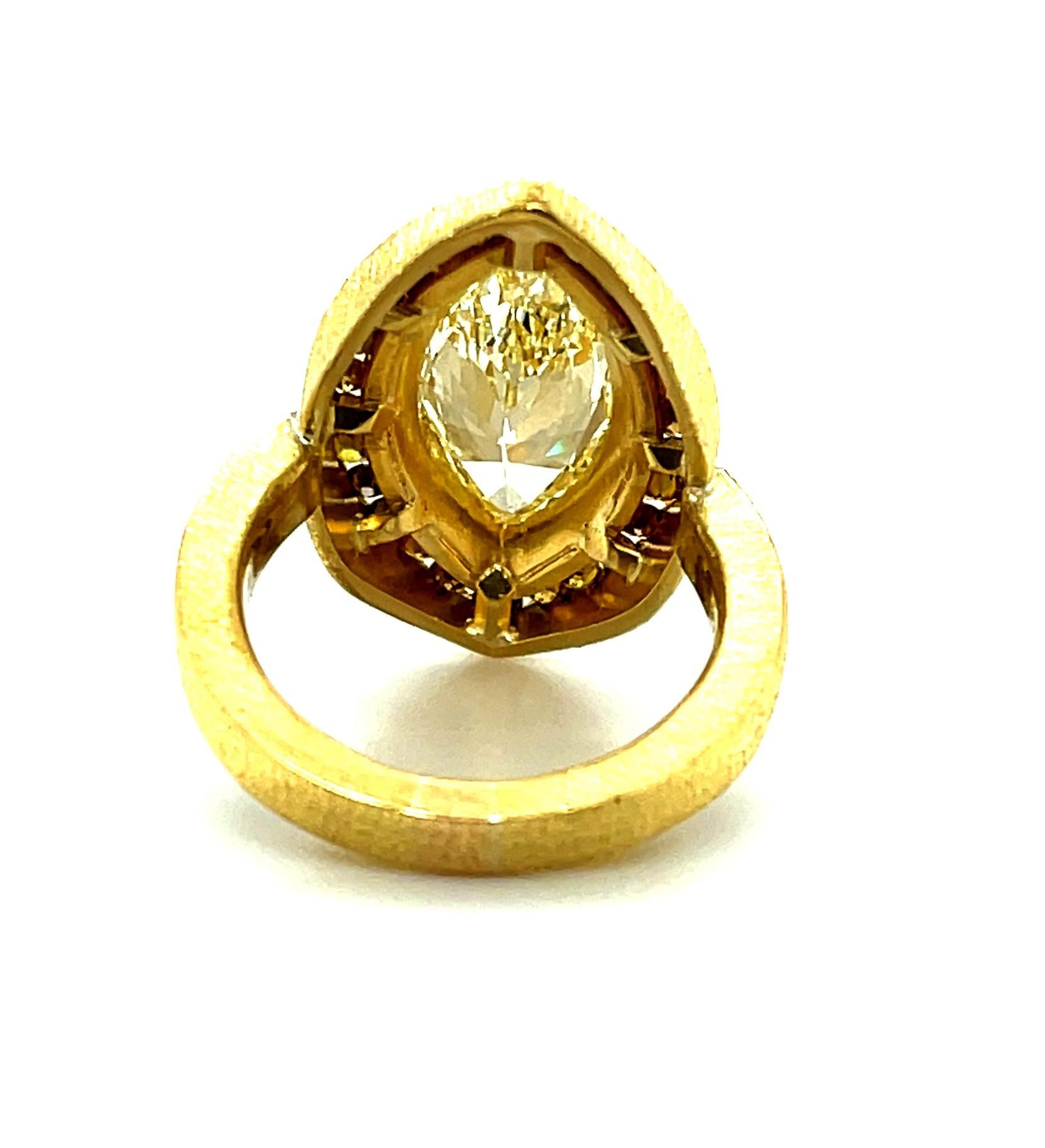 Marquise Cut 3.54 Carat Marquise Diamond Ring in 22K Yellow Gold with Fancy Colored Diamonds For Sale