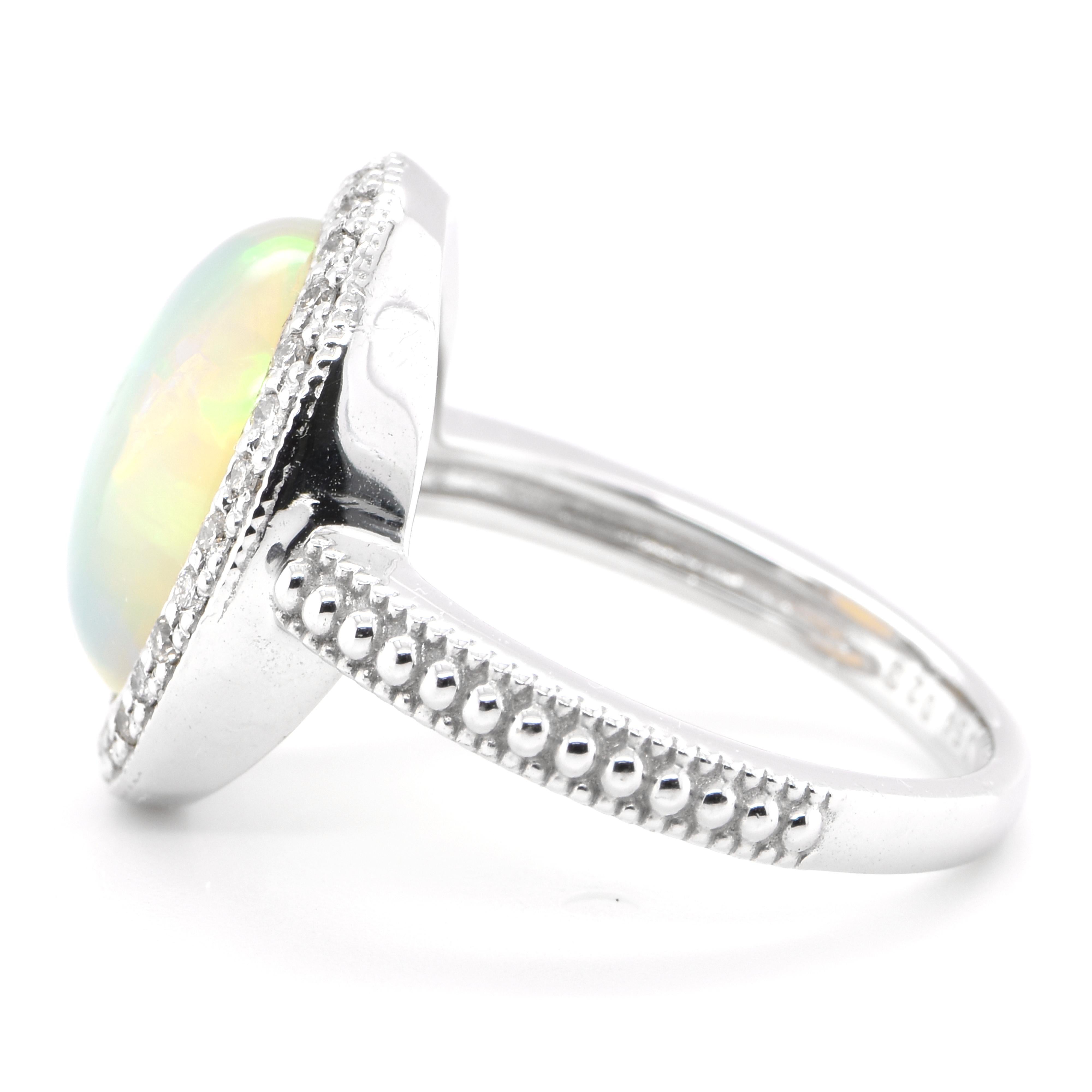 Cabochon 3.54 Carat Natural White Opal and Diamond Vintage Ring Set in 18K White Gold