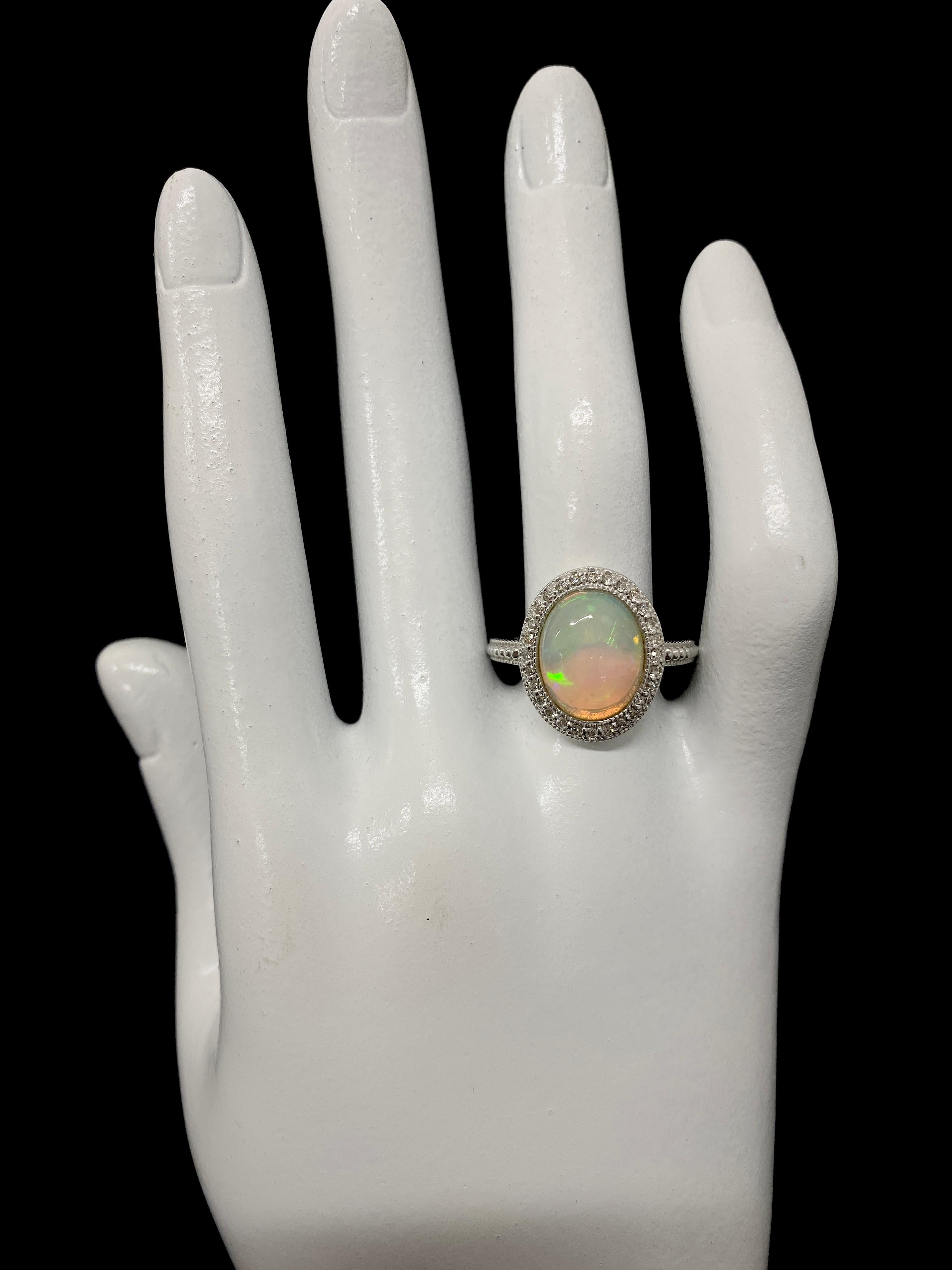 3.54 Carat Natural White Opal and Diamond Vintage Ring Set in 18K White Gold 1