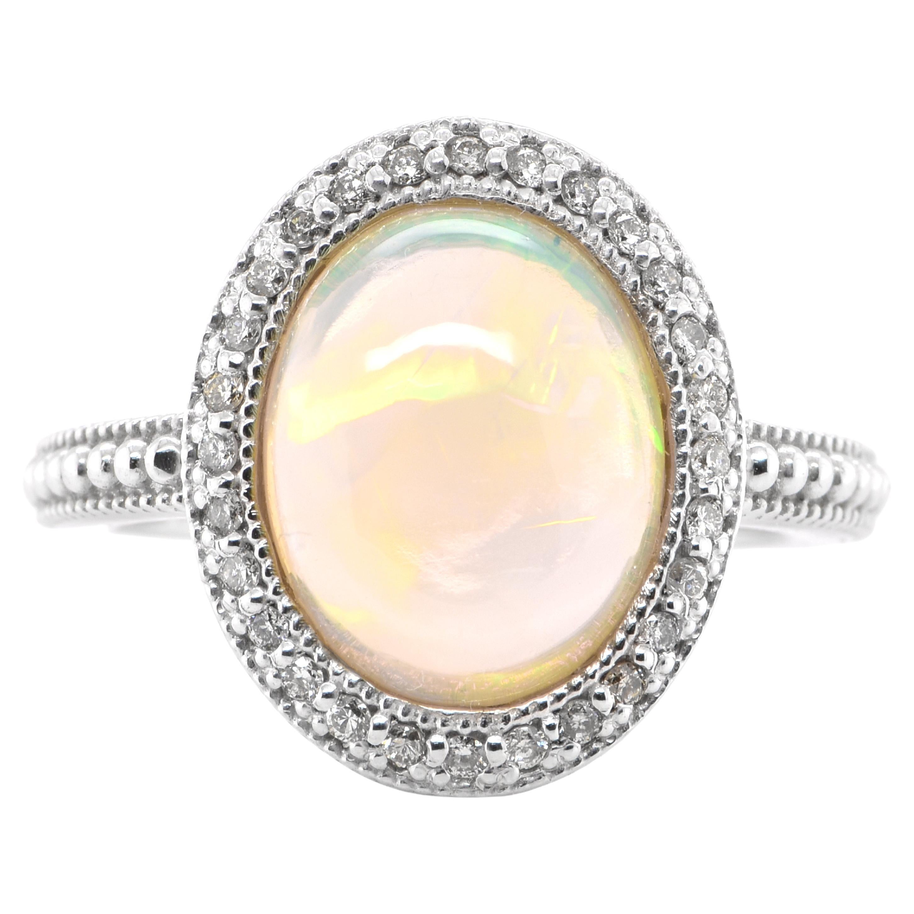 3.54 Carat Natural White Opal and Diamond Vintage Ring Set in 18K White Gold