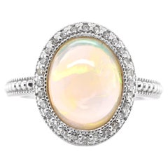 3.54 Carat Natural White Opal and Diamond Vintage Ring Set in 18K White Gold