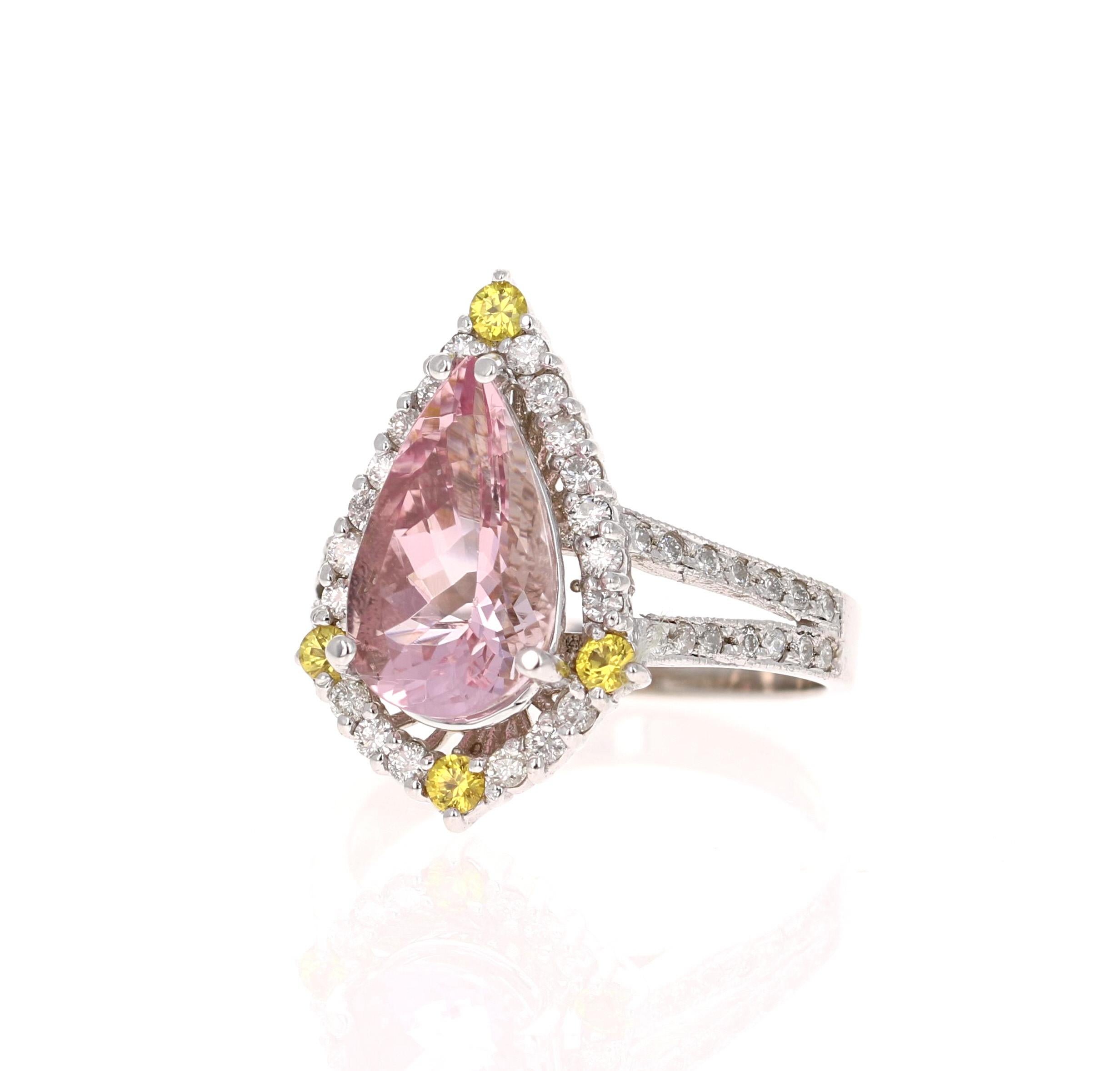 A lovely Engagement Ring Option or as an alternate to a Pink Diamond Ring! 

This gorgeous and classy Morganite, Yellow Sapphire and Diamond Ring has a 2.71 Carat Pear Cut Pink Morganite and has 48 Round Cut Diamonds that weigh 0.65 Carats (Clarity: