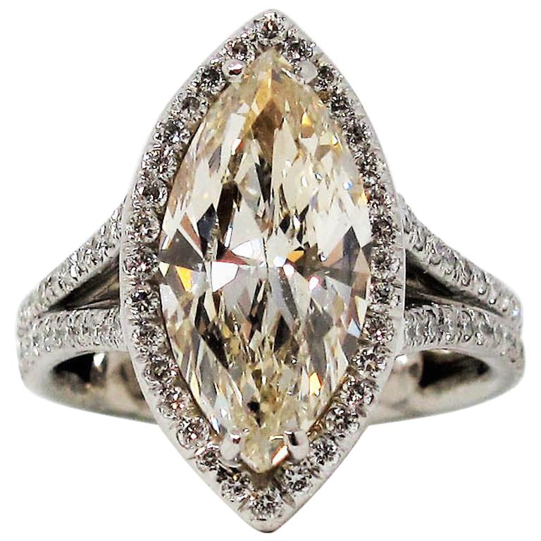 3.01 Carat Marquis Diamond With Halo Split Shank Engagement Ring in Platinum For Sale