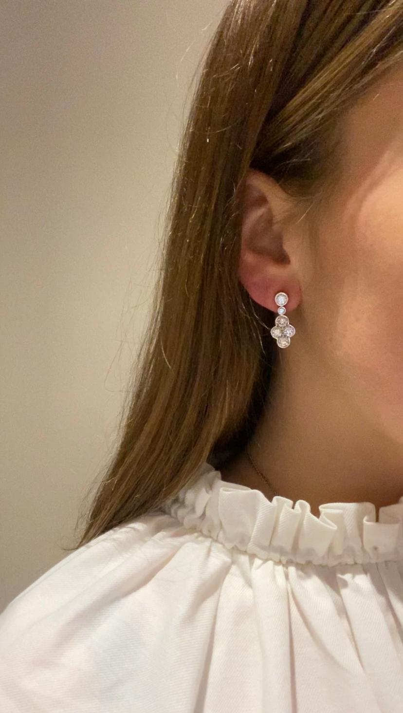 Those earrings have been made by our craftsman in Antwerp, Belgium. 
White-gold Pendant Earrings.18K White gold earrings set with 10 diamonds for a total of 3.54 Carats (Estimated H colour - Si purity). The diamonds come directly from Antwerp, world