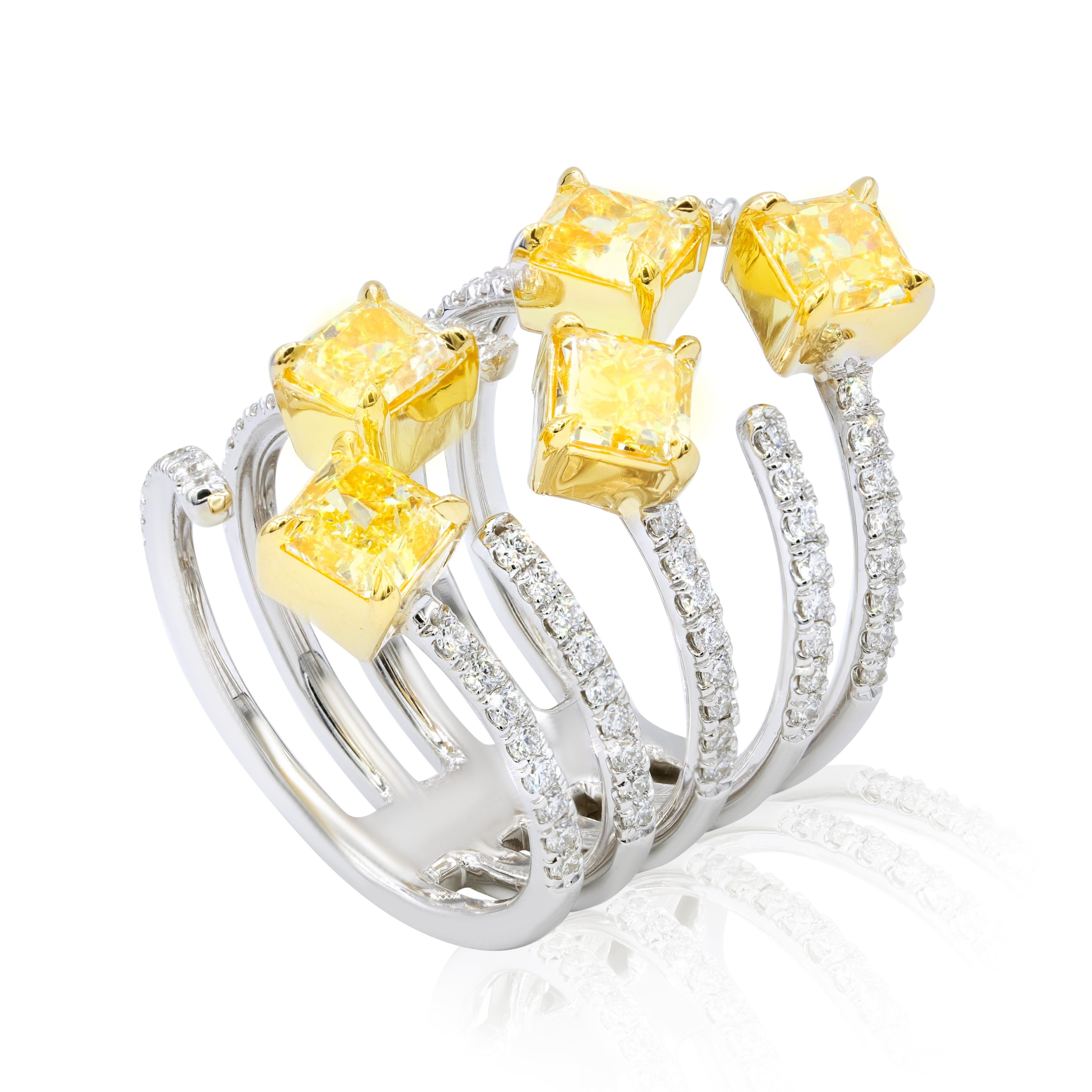18KT two tone multi shaped fancy yellow diamond ring with 3.54 carats of five yellow diamonds and 0.90 carats micro pave diamonds.
Ring size: 6.5
Can be resized to any finger size.

This product comes with a certificate of appraisal
This product