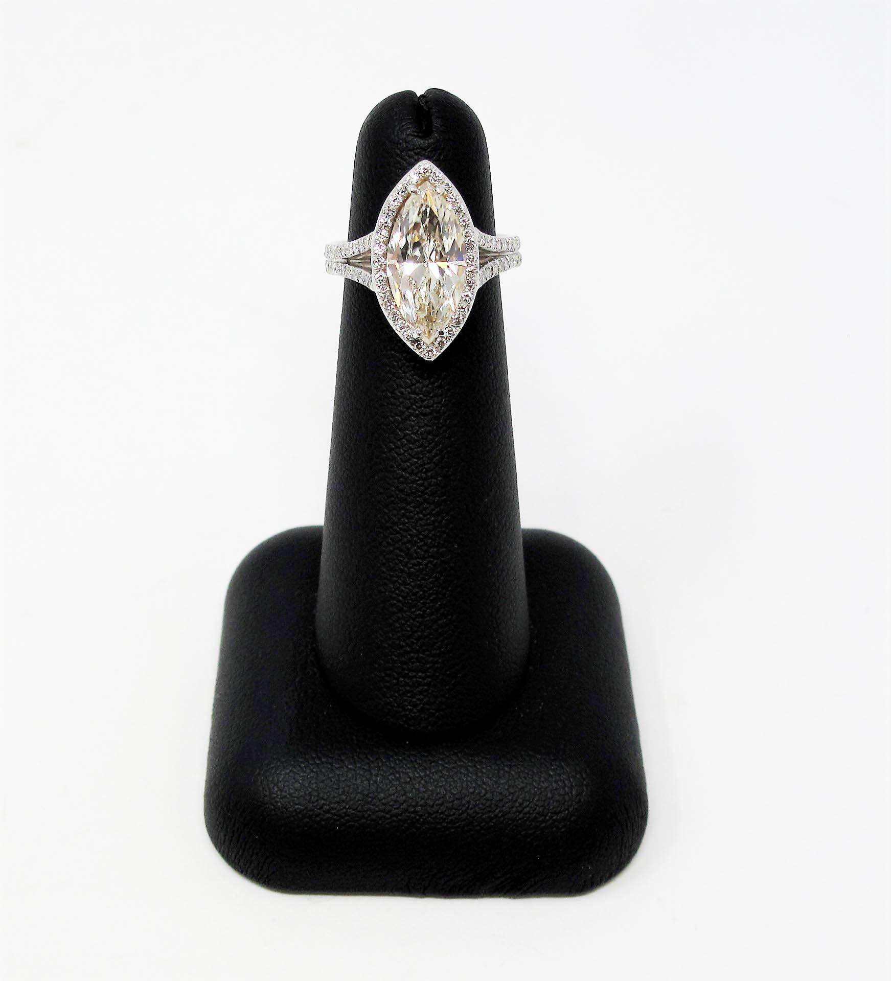 3.01 Carat Marquis Diamond With Halo Split Shank Engagement Ring in Platinum For Sale 1