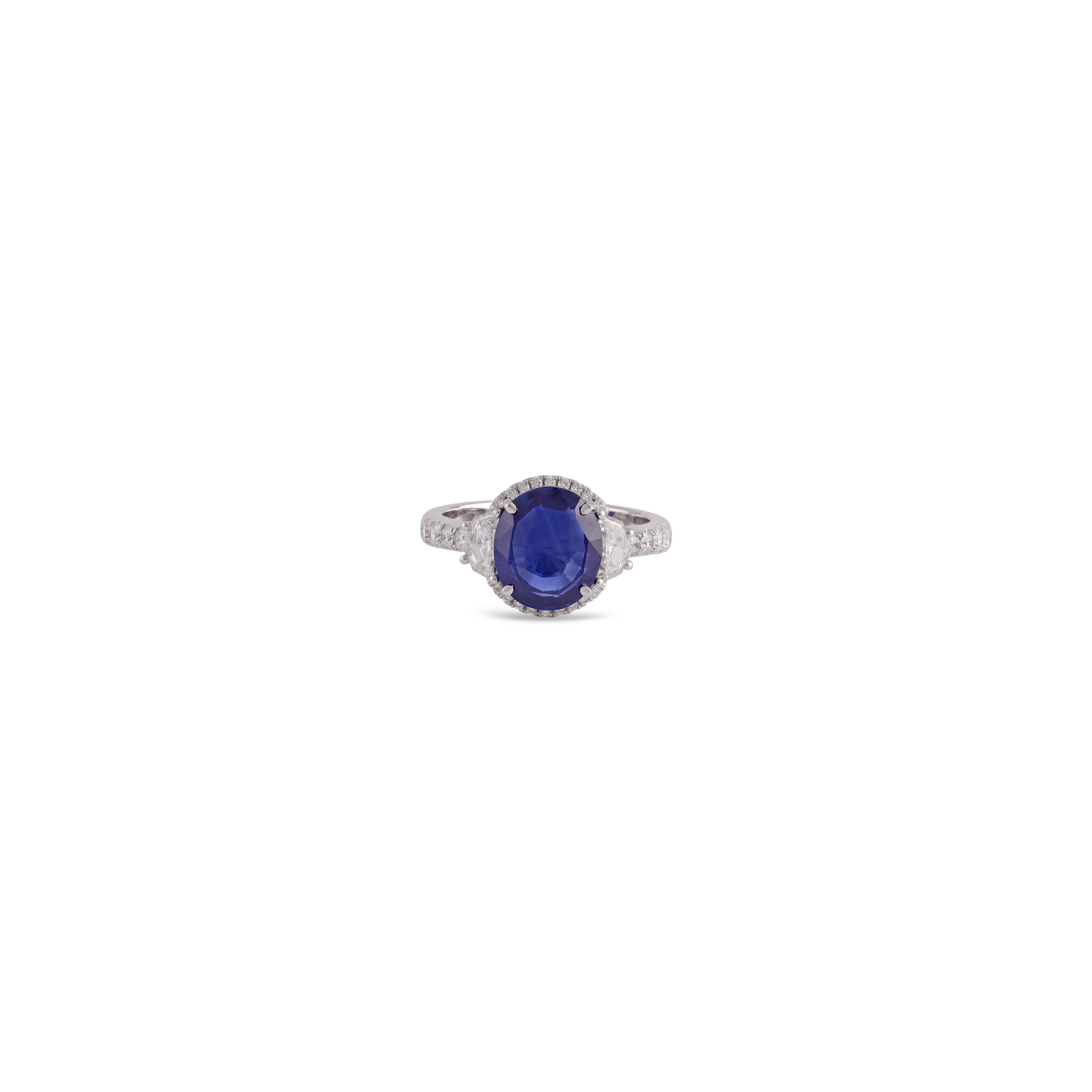 Its an exclusive  High Value Clear Blue Sapphire & diamond ring studded in 18k White gold with 1 piece of Sapphire weight 3.54 carat with 40 pieces of diamonds weight 0.96 carat this entire ring is studded in 18k White gold , ring size can be change