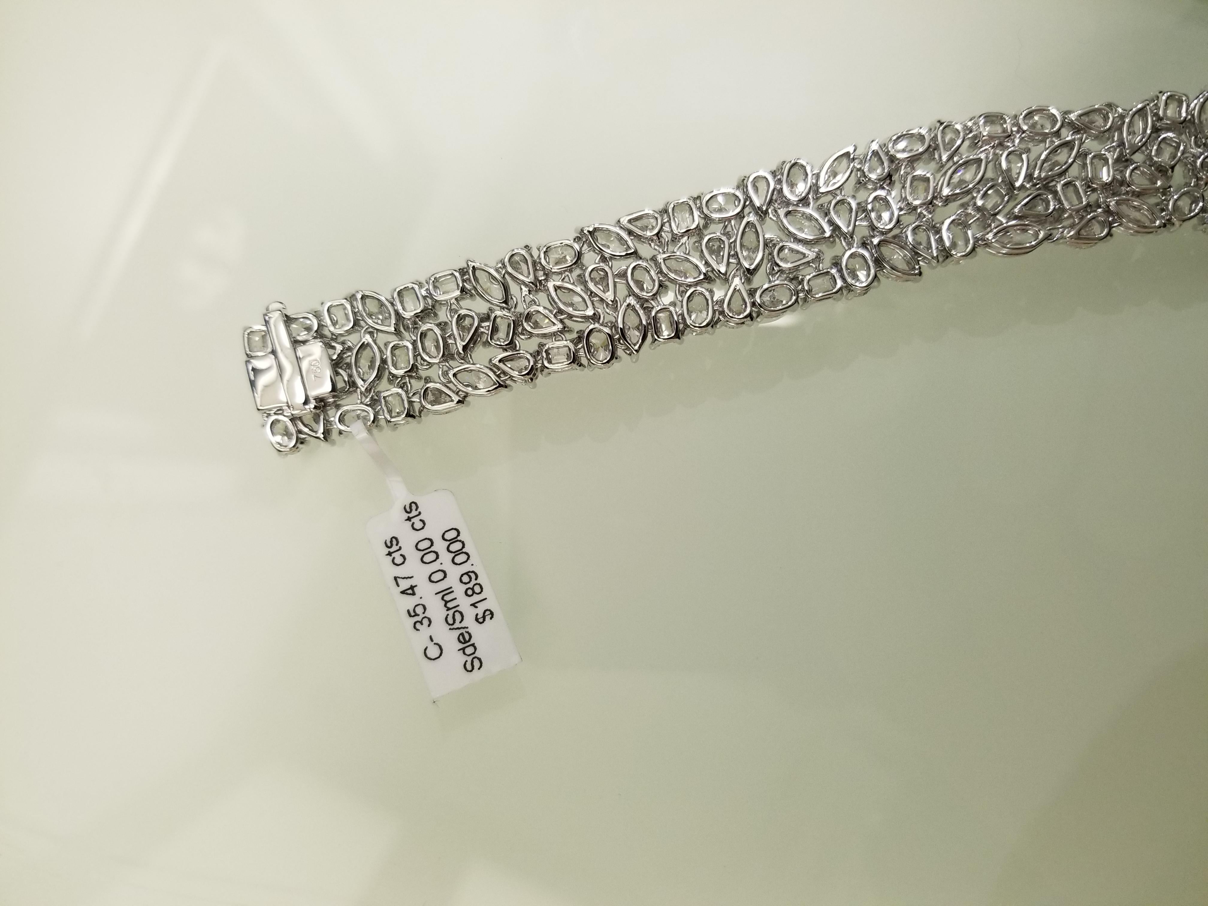 Magnificent bracelets crafted in 18 karat gold containing 35 carats of high quality diamonds This bracelet will easily be your wife's favorite piece and her jewelry collection

Composed with mixed Fancy shape Diamonds put together with my master
