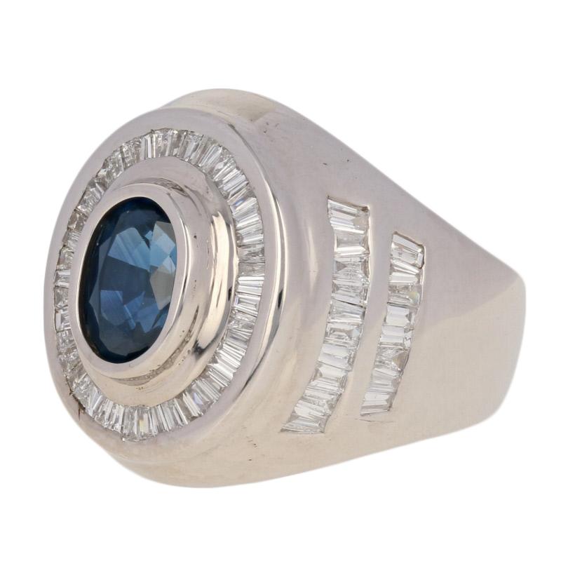 Sharply dressed and ready to impress! Crafted in 14k white gold, this eye-catching halo ring displays a rich blue sapphire solitaire accompanied by a luminous collection of diamond accents.  

This ring is a size 7.

Metal Content: Guaranteed 14k