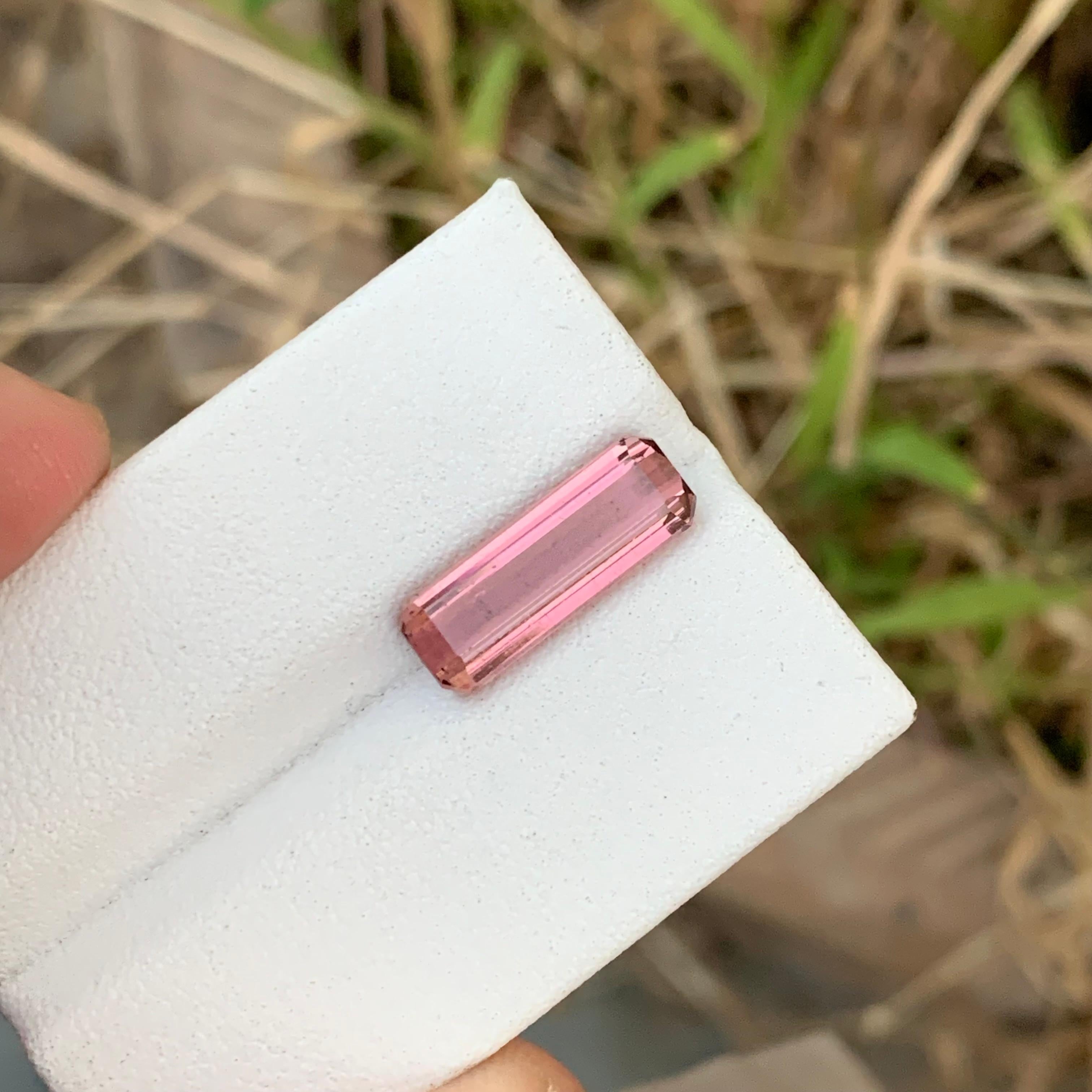 Loose Pink Tourmaline
Weight: 3.55  Carats
Dimension: 15 x 5.3 x 4.4 Mm
Colour: Pink
Origin: Afghanistan
Shape : Emerald 
Certificate: On Demand
Treatment: Non

Pink tourmaline, known for its captivating hue ranging from delicate pastel shades to