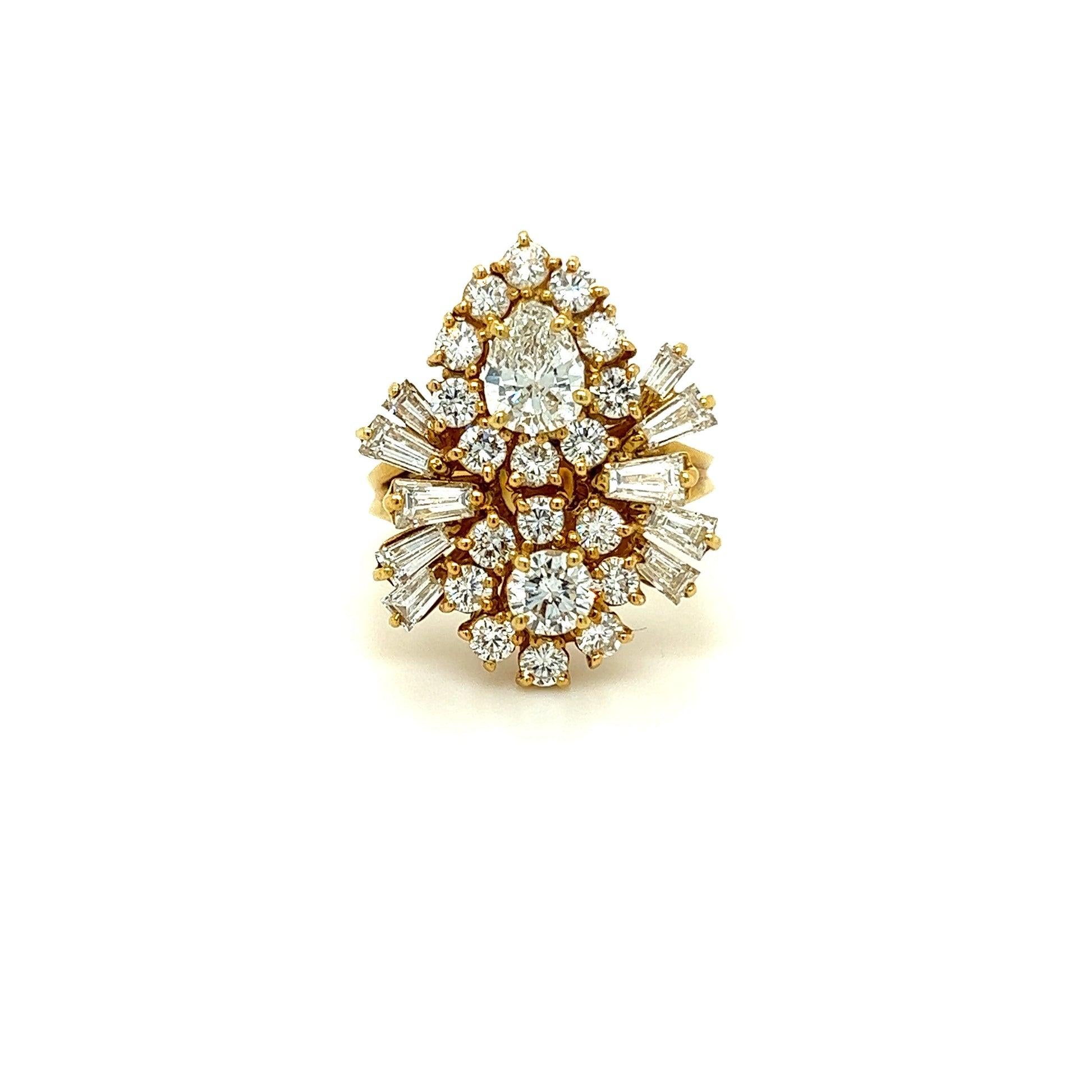 Gorgeous 18k Yellow Gold Diamond Cluster Ring
Features Pear Shaped and Round Brilliant Cut Natural Diamond With Thirty Nine Round Brilliant Cut and Tapered Baguette Cut Natural Diamonds.

Stone : Dimond
Type: Natural
Shape & Cut : Pear and round