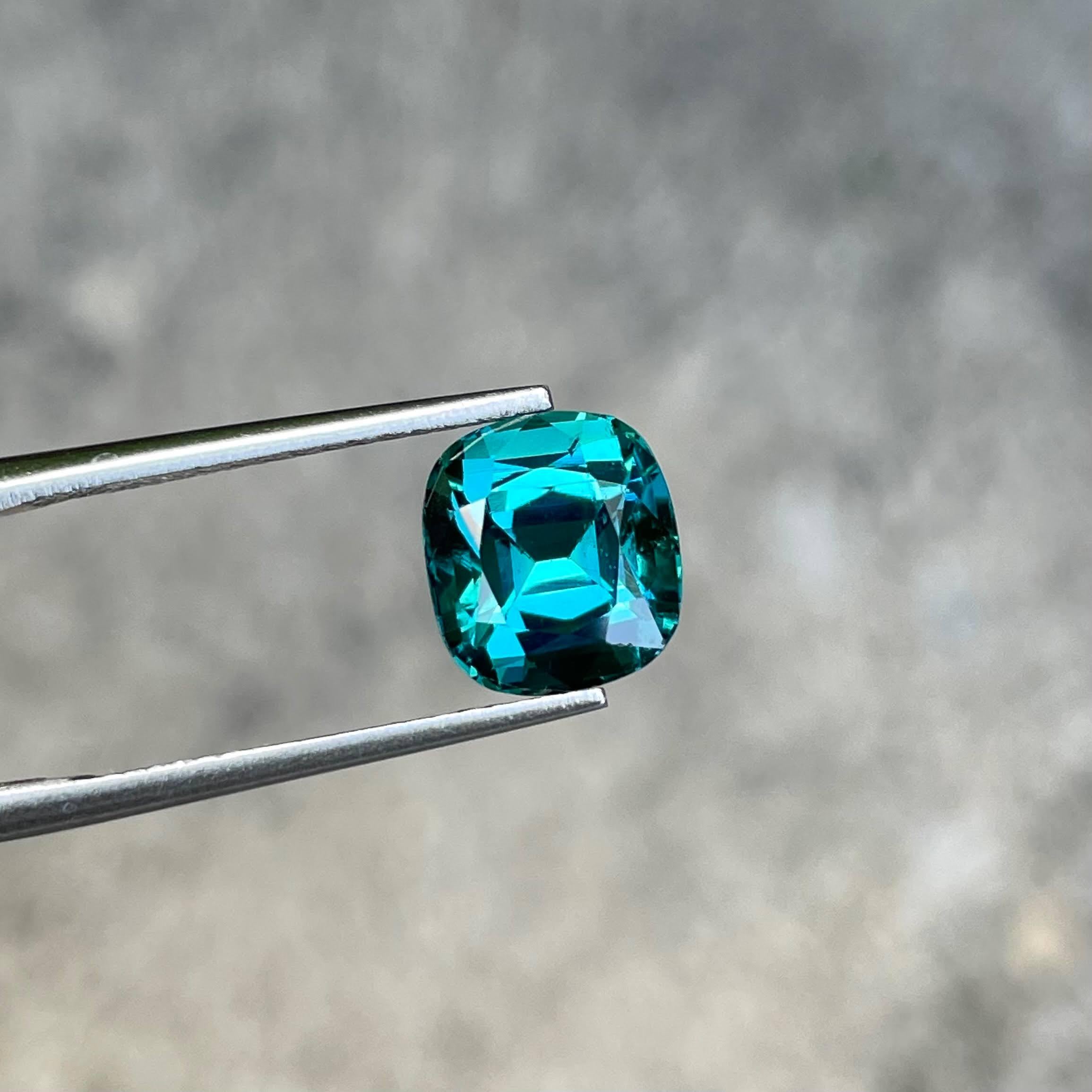 Weight 3.55 carats 
Dimensions 8.32x9.25x6.70 mm
Treatment None
Clarity Eye Clean
Origin Afghanistan
Shape Cushion
Cut Step Cushion




The captivating allure of a 3.55-carat Lagoon Blue Tourmaline takes center stage, showcasing its exquisite beauty
