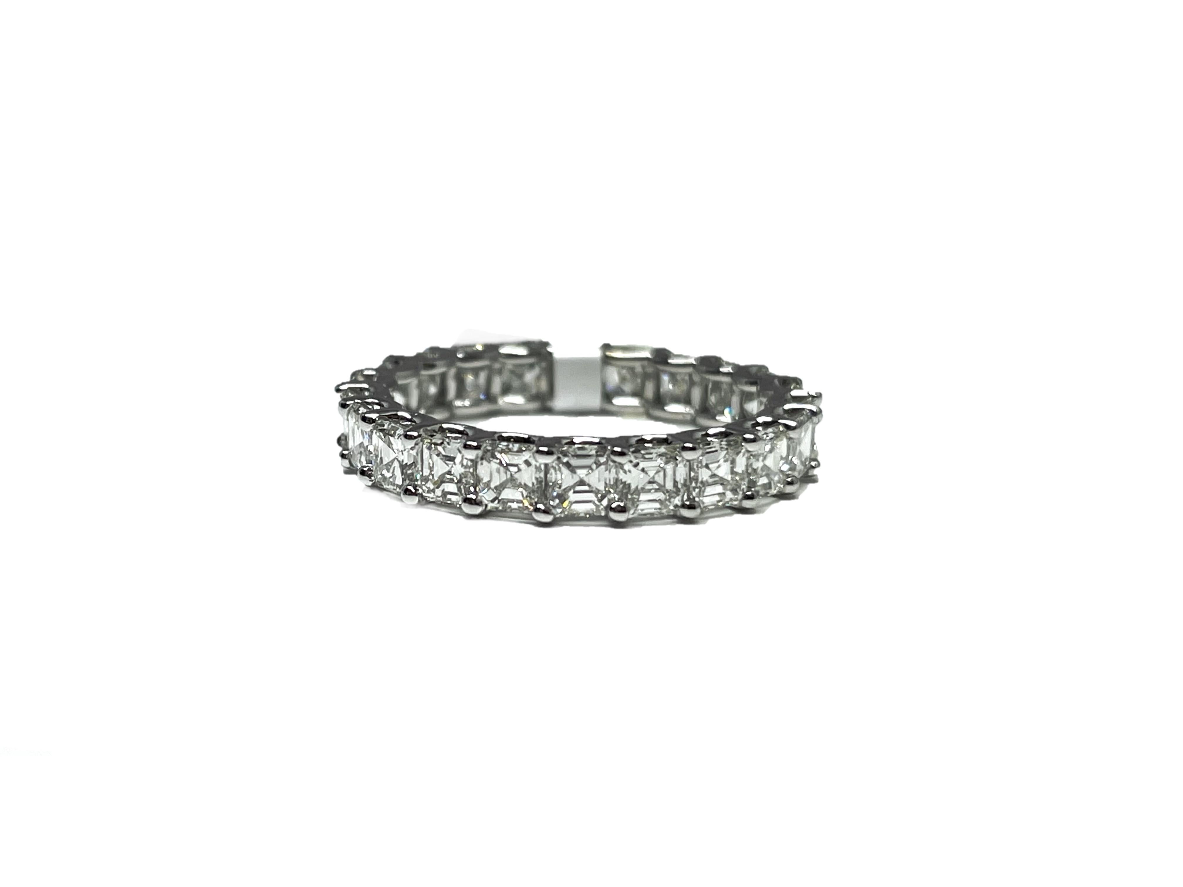 This stunning 18k white gold diamond band features 23 Asscher cut diamonds weighing 3.55 ct. The diamonds are graded G-H in color and VS1-VS2 in clarity.