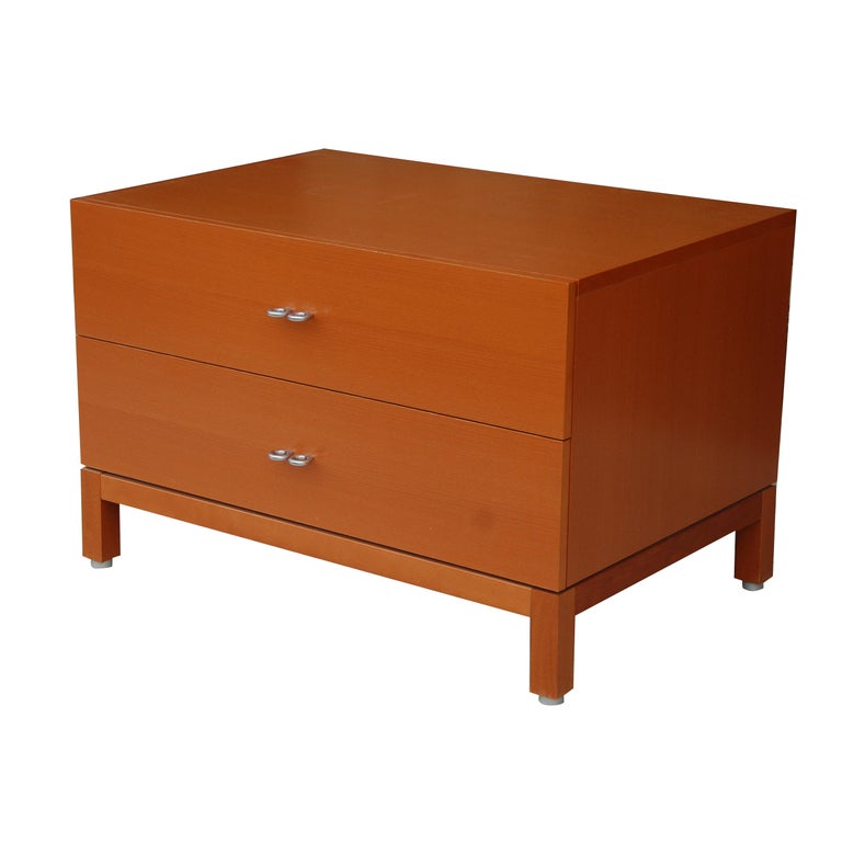 Modern pearwood dresser
 
 
Warm pearwood combined with brushed metal pulls compliment this modern piece.
Two drawers. Two available. Measure: 35