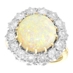 3.55ct Cabochon Cut Opal and 2.68ct Diamond Yellow Gold Cluster Ring