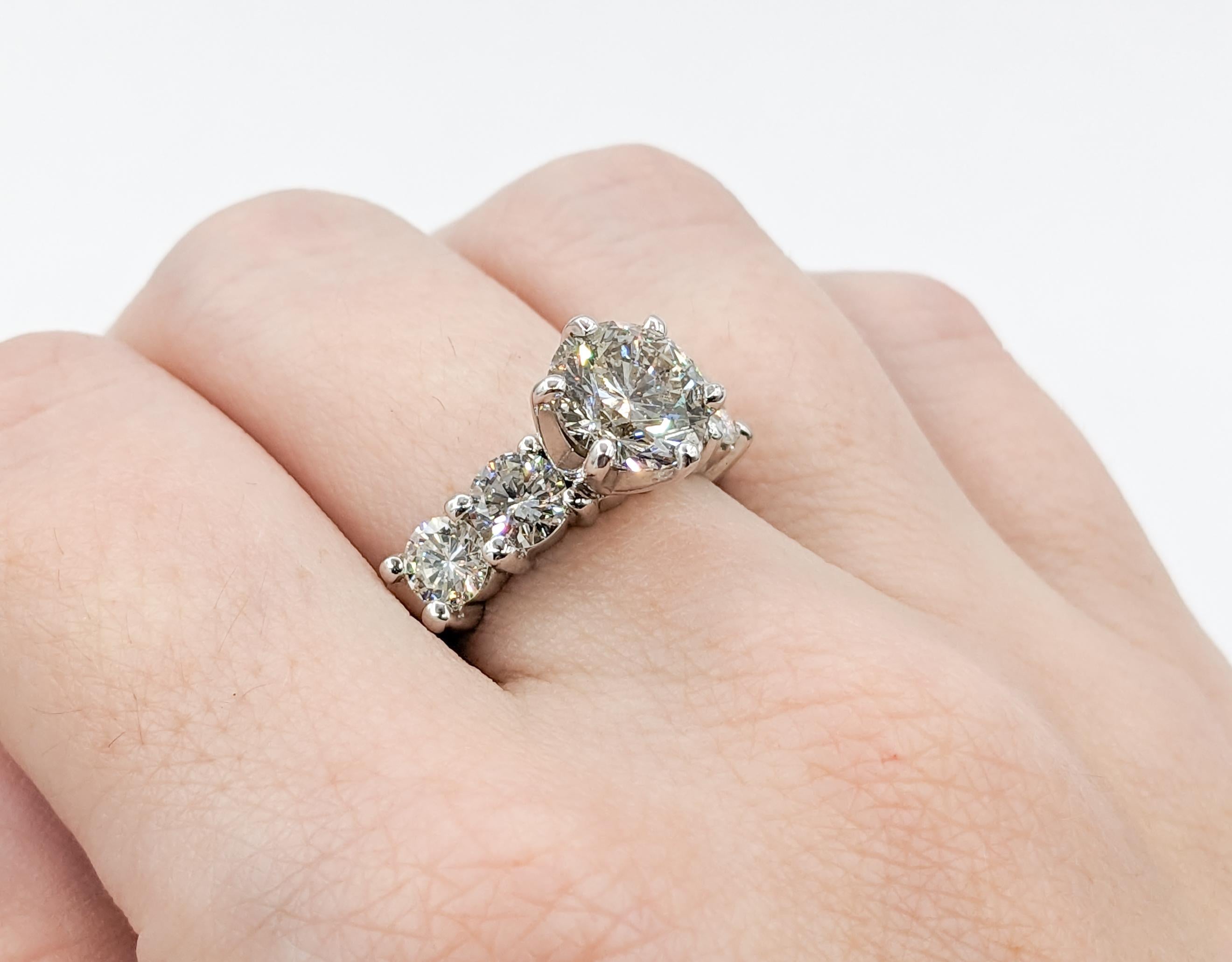 3.55ctw Diamond Engagement Ring in 14kt White Gold Ring

Step into a world of timeless elegance with this mesmerizing diamond engagement ring. Masterfully crafted in 14kt White Gold, it showcases a dazzling 2.05ct Round Diamond, possessing an I1