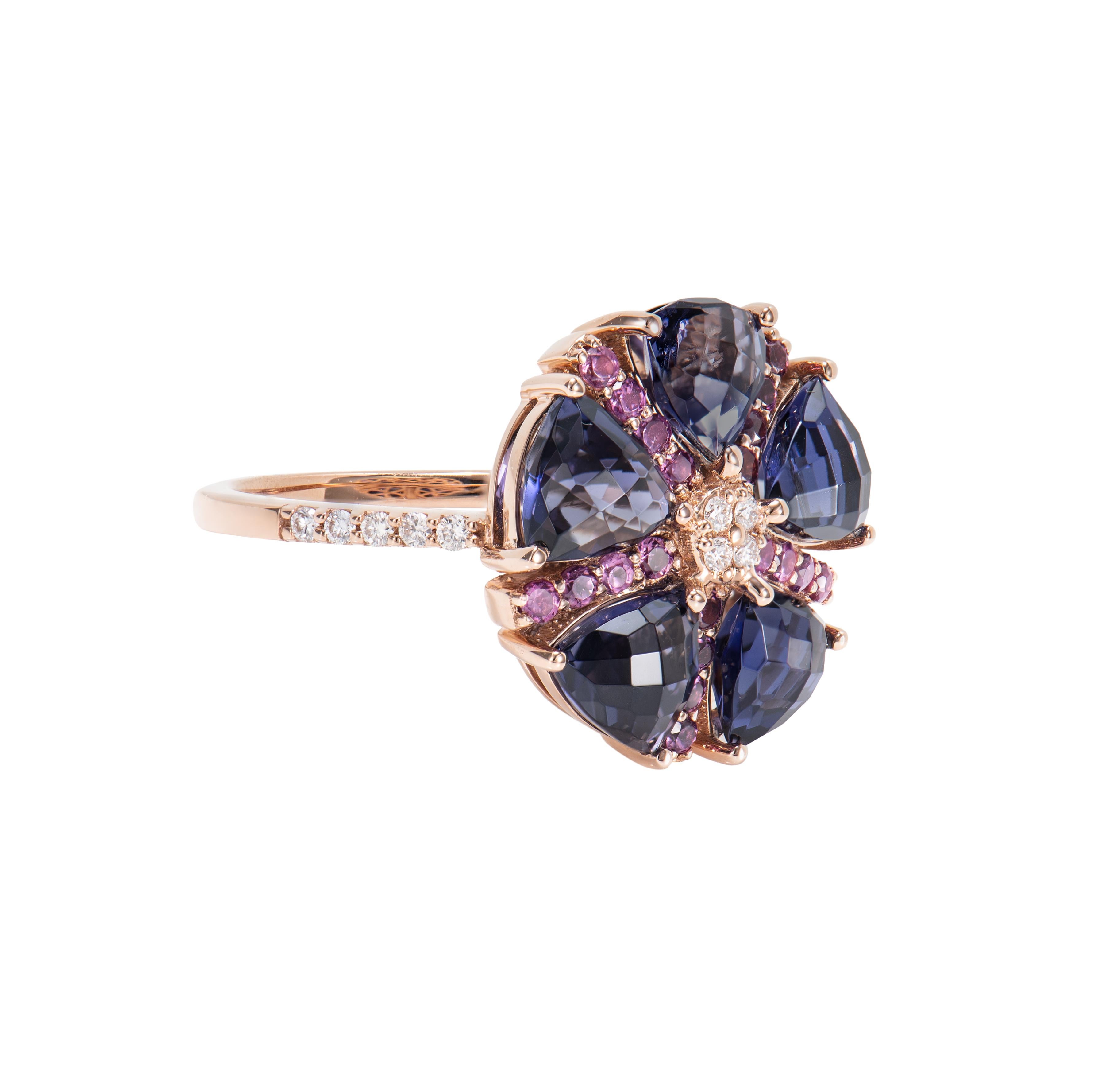 These are fancy iolite Ring in a trillion shape with purple hue. The Ring is elegant and can be worn for many occasions. 

Iolite Fancy Ring in 18 Karat Rose Gold with Rhodolite and White Diamond.

Iolite: 3.56 carat, 5.50mm size, Trillion
