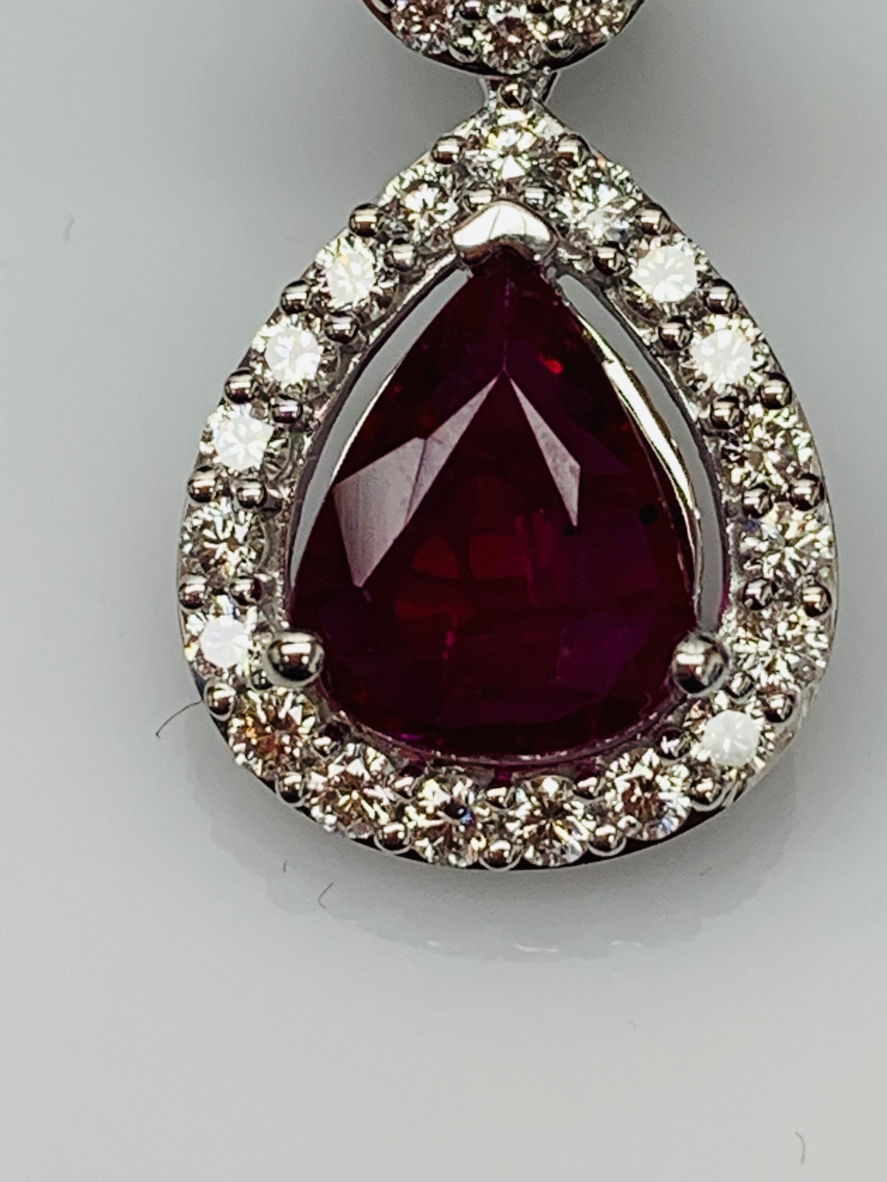 Pear Cut 3.56 Carat of Pear Shape Ruby Diamond Drop Earrings in 18K White Gold For Sale