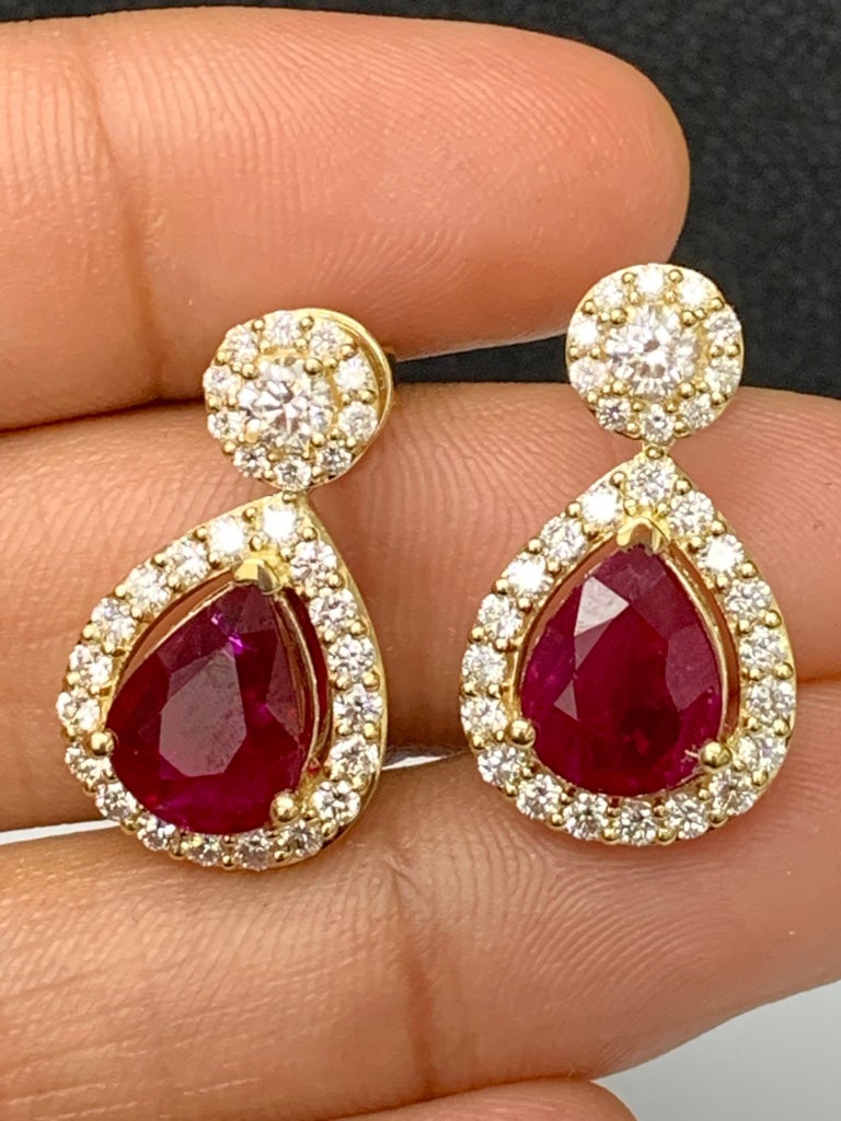 Orecchini in oro giallo con rubini e diamanti - GIOIELLERIA ROMA – GIOIELLI IN ORO, ARGENTO E Orecchini in oro giallo con rubini e diamanti - GIOIELLERIA ROMA – GIOIELLI IN ORO, ARGENTO E