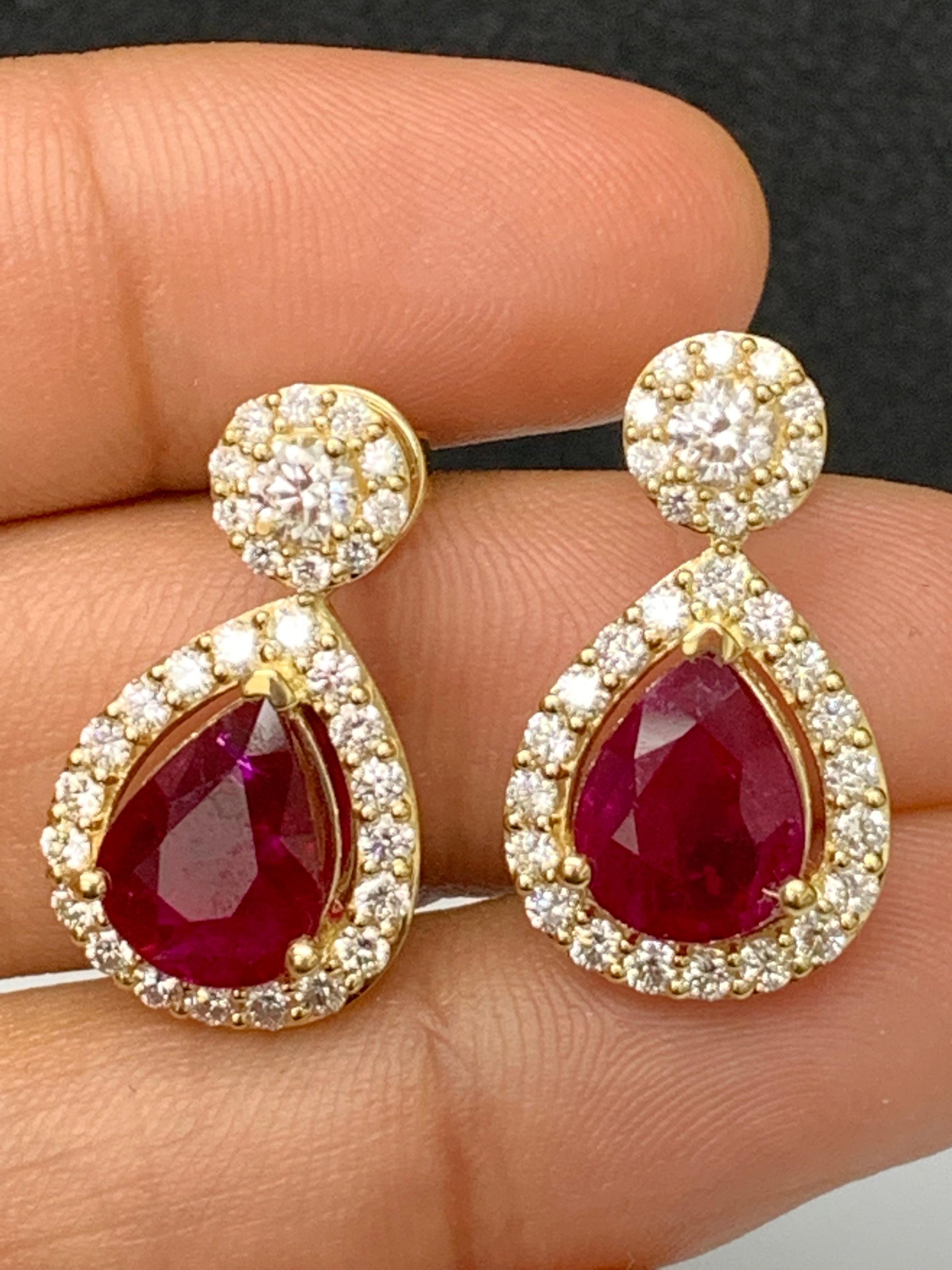 Pear Cut 3.56 Carat of Pear Shape Ruby Diamond Drop Earrings in 18K Yellow Gold For Sale