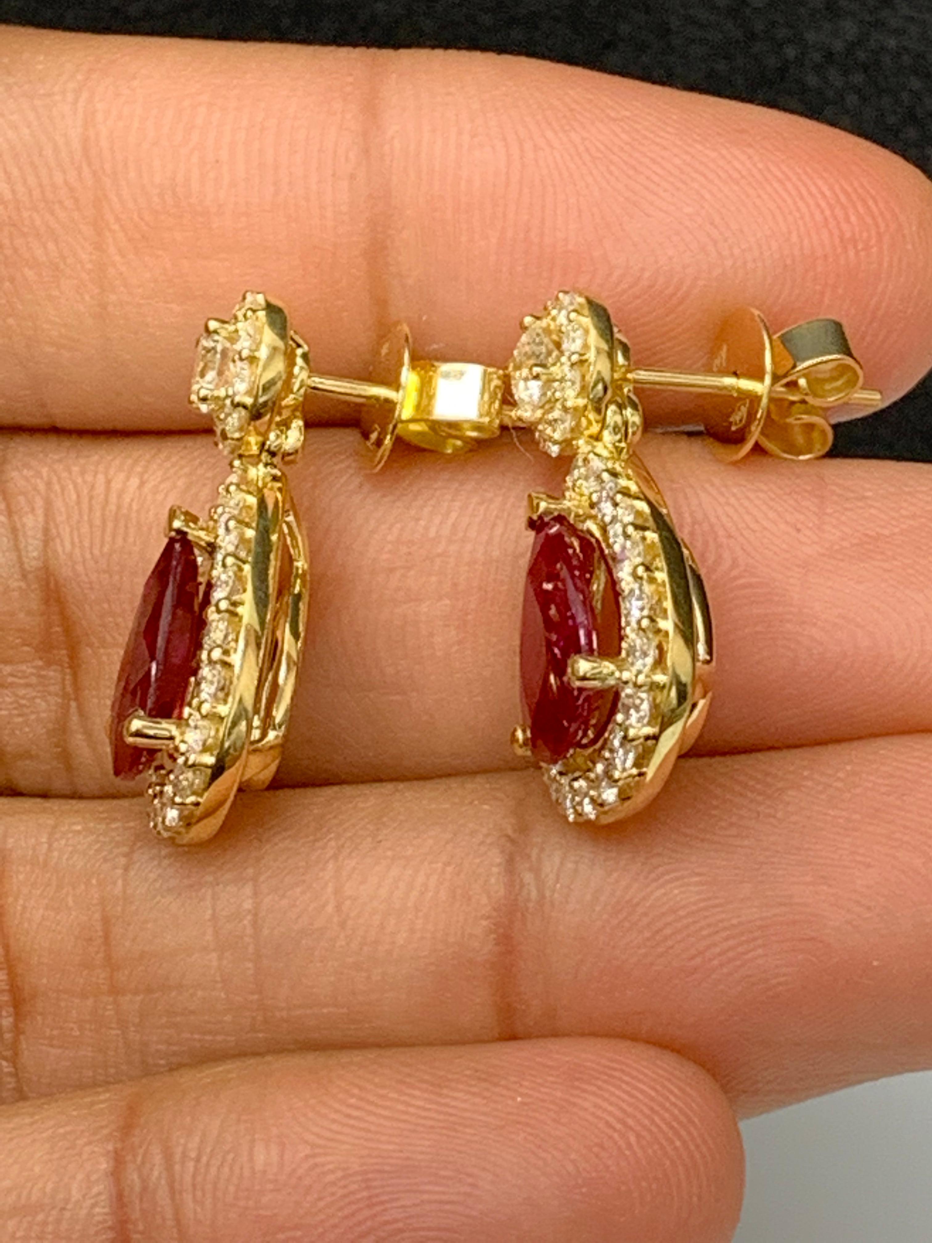 Women's 3.56 Carat of Pear Shape Ruby Diamond Drop Earrings in 18K Yellow Gold For Sale