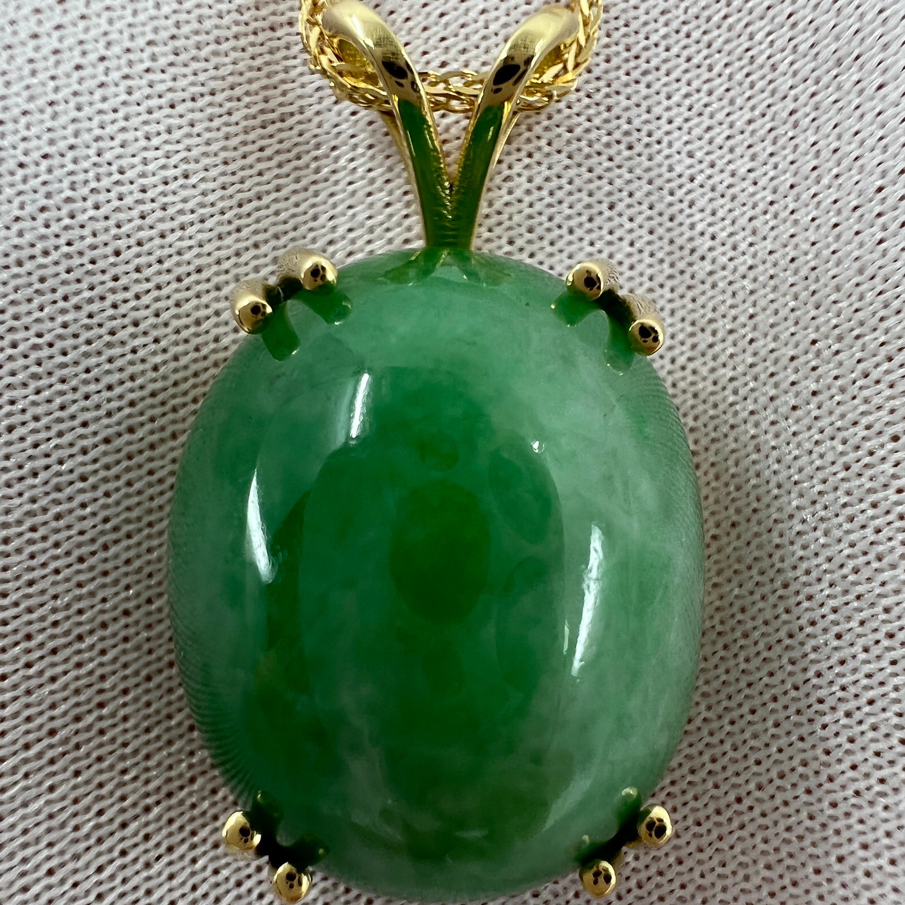Rare GIA Certified Untreated Jadeite Jade A-Grade Green Pendant Necklace.

Huge 35.69 carat beautiful untreated jadeite stone with a mottled green colour and very good oval cabochon cut. 

Incredibly rare large size jadeite stone. A single cabochon