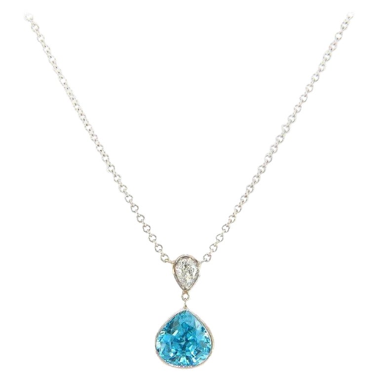 3.56ct Blue Pear Zircon and 0.21ct Pear Diamond Bezel Set Pendant Necklace, 14kt For Sale