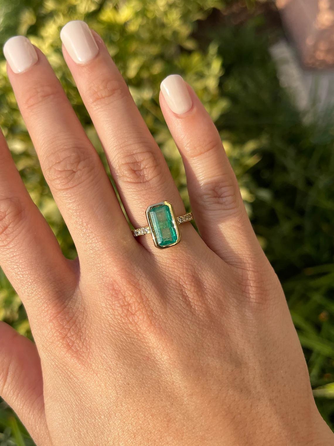elongated emerald cut diamond ring