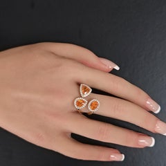 Anillo de oro amarillo con un diamante redondo y un granate «Fanta» de 3.57 quilates
