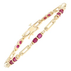 3.57 Carat Oval Cut Ruby and Diamond Bracelet, 14 Karat Yellow Gold Link