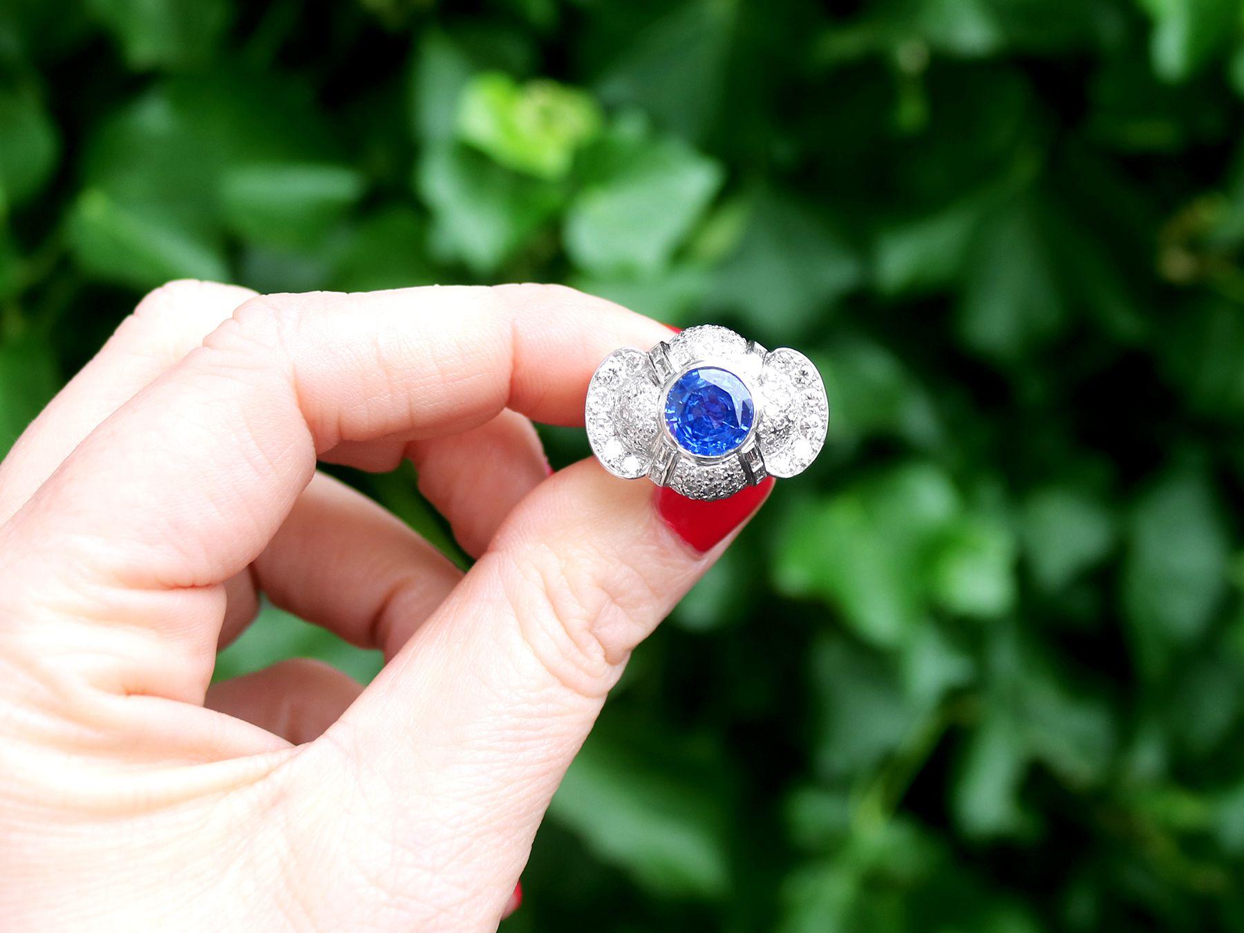 A stunning vintage 1950s 3.57 carat sapphire and 2.37 carat diamond, platinum cocktail ring; part of our diverse gemstone jewelry and estate jewelry collections.

This stunning, fine and impressive sapphire and diamond ring has been crafted in