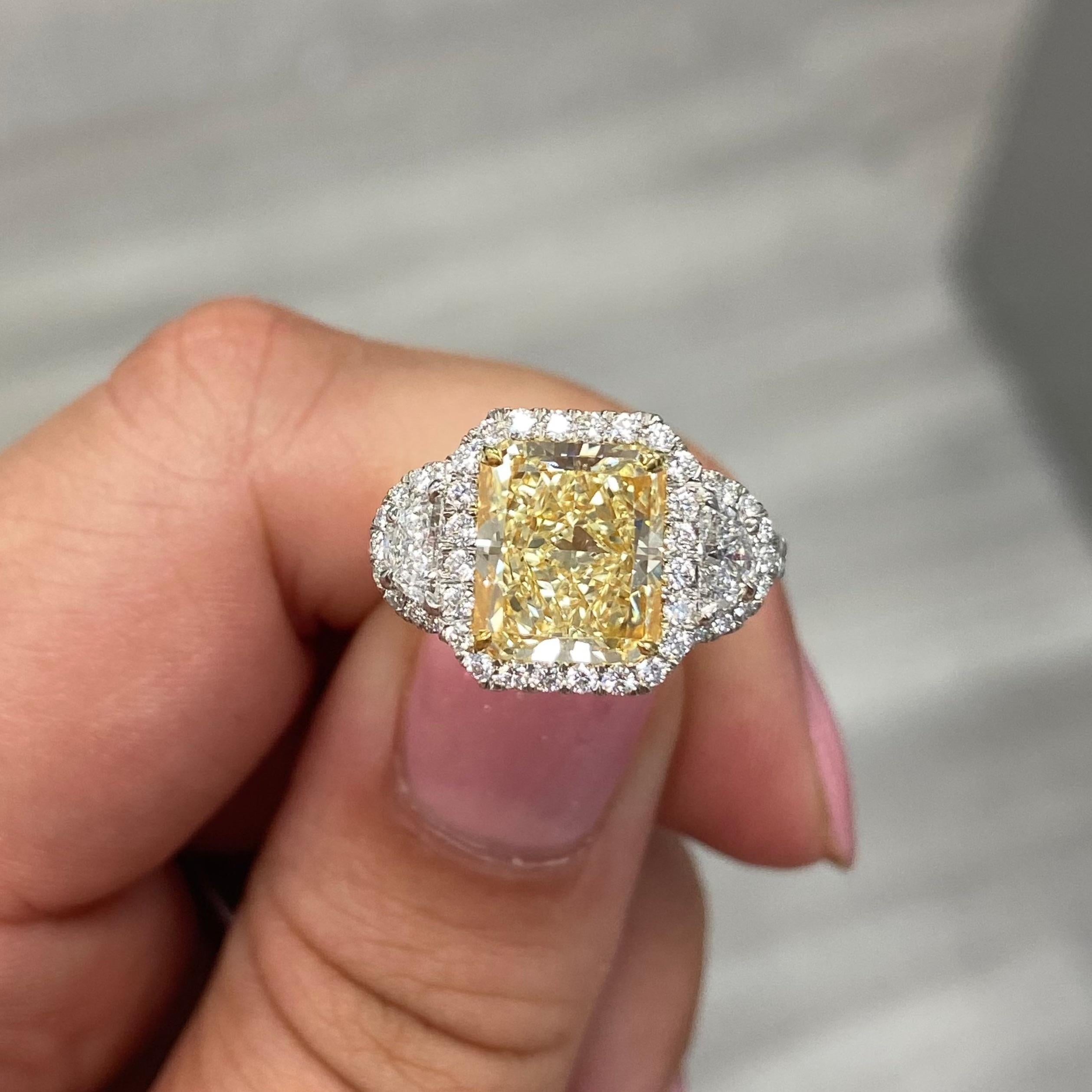 3.57 Carat
Light Yellow (WX) Radiant Diamond
VS1 Clarity 
0.39 Carat Half Moon Side Diamonds
0.87 Carats of Pave
GIA Certified Diamond

Making Extraordinary Attainable with Rare Colors
