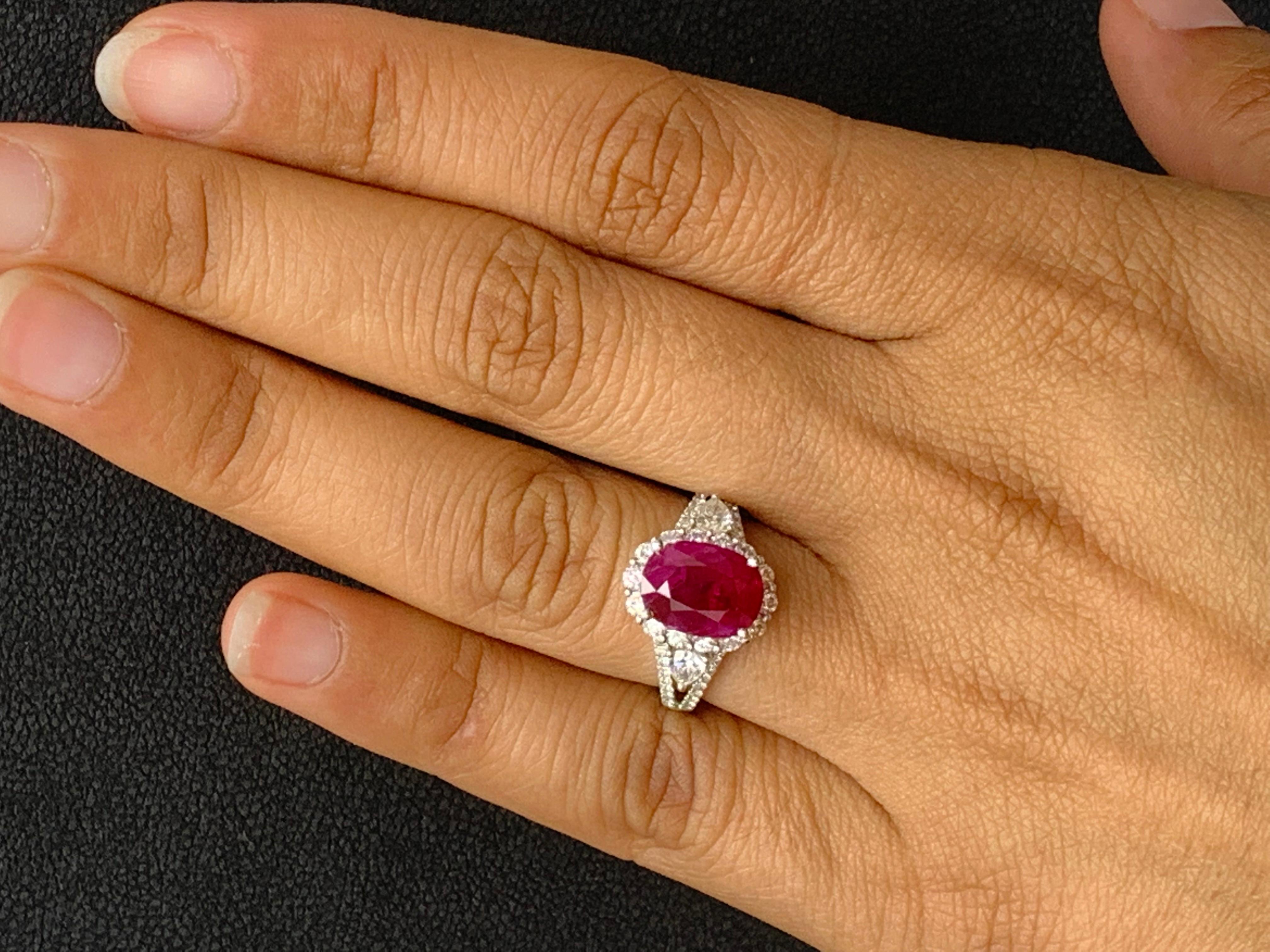 3.58 Carat Oval Cut Ruby and Diamond Halo Ring in 18K White Gold For Sale 11