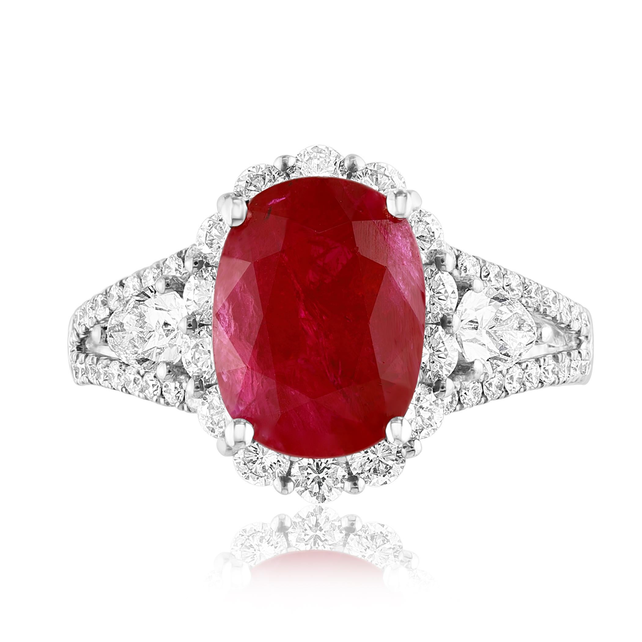 3.58 Carat Oval Cut Ruby and Diamond Halo Ring in 18K White Gold In New Condition For Sale In NEW YORK, NY