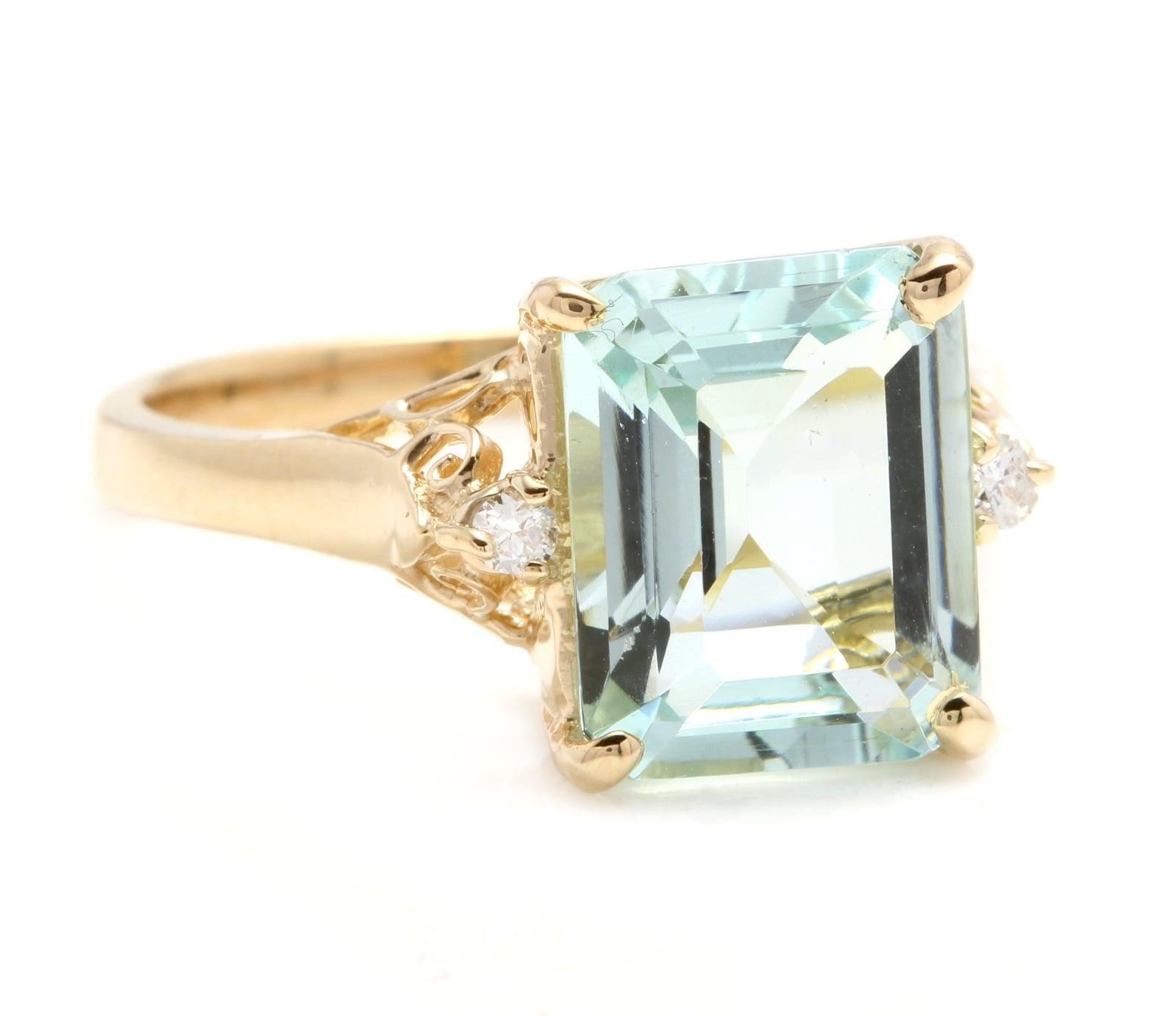 3.58 Carats Impressive Natural Aquamarine and Diamond 14K Yellow Gold Ring

Suggested Replacement Value: Approx. $3,000.00

Total Natural Aquamarine Weight is: Approx. 3.50 Carats 

Aquamarine Measures: Approx. 11.00 x 9.00mm

Natural Round Diamonds