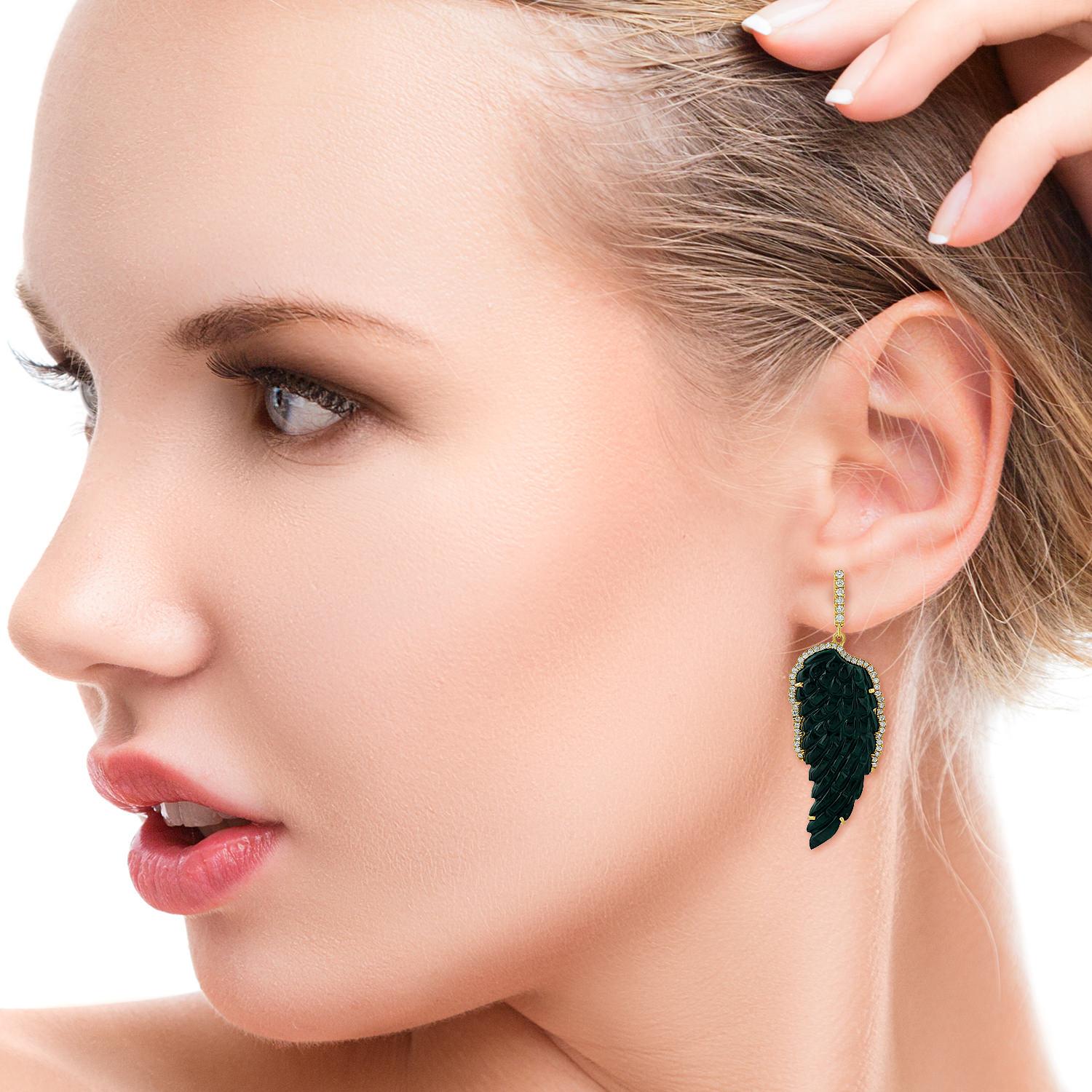 Handcrafted from 18-karat gold, these stunning feather earrings are set with 35.85 carats carved malachite and .77 carats of sparkling diamonds.

FOLLOW  MEGHNA JEWELS storefront to view the latest collection & exclusive pieces.  Meghna Jewels is