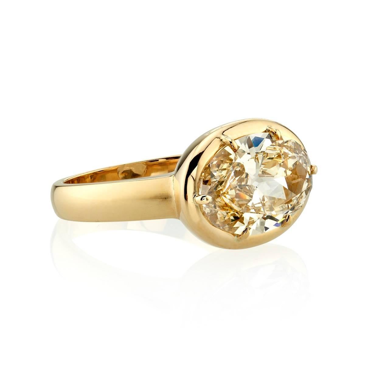3.58ct M/SI1 EGL certified Moval cut diamond set in a handcrafted 18k yellow gold mounting.  A twist on our signature Cori ring. 