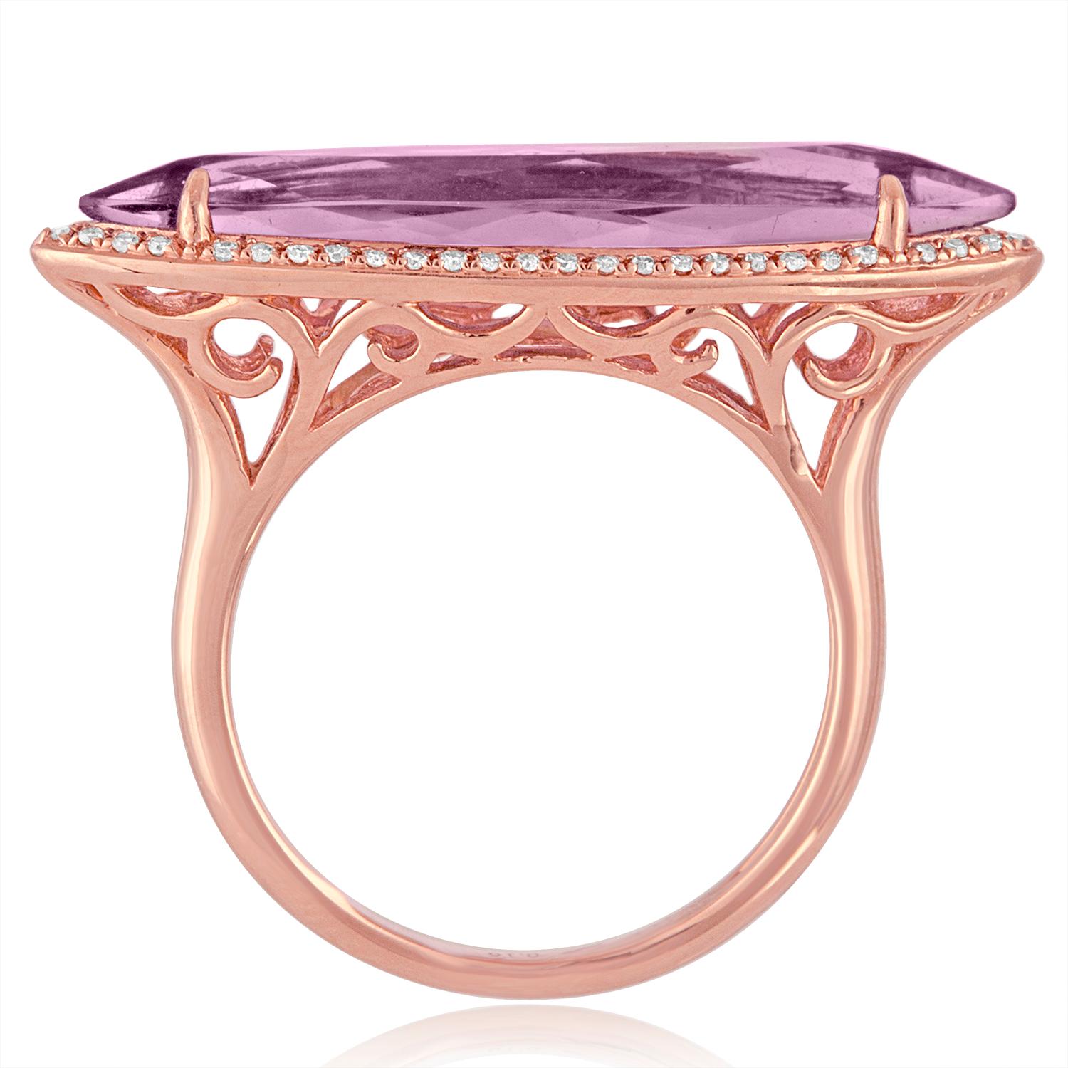 Very Unusual Horizontal Ring
The ring is 14K Rose Gold
The center stone is an Marquise Amethyst 3.59 Carats
There are 0.16 Carats in Diamonds H/I VS2/SI1
The top of the ring measures a little over 1